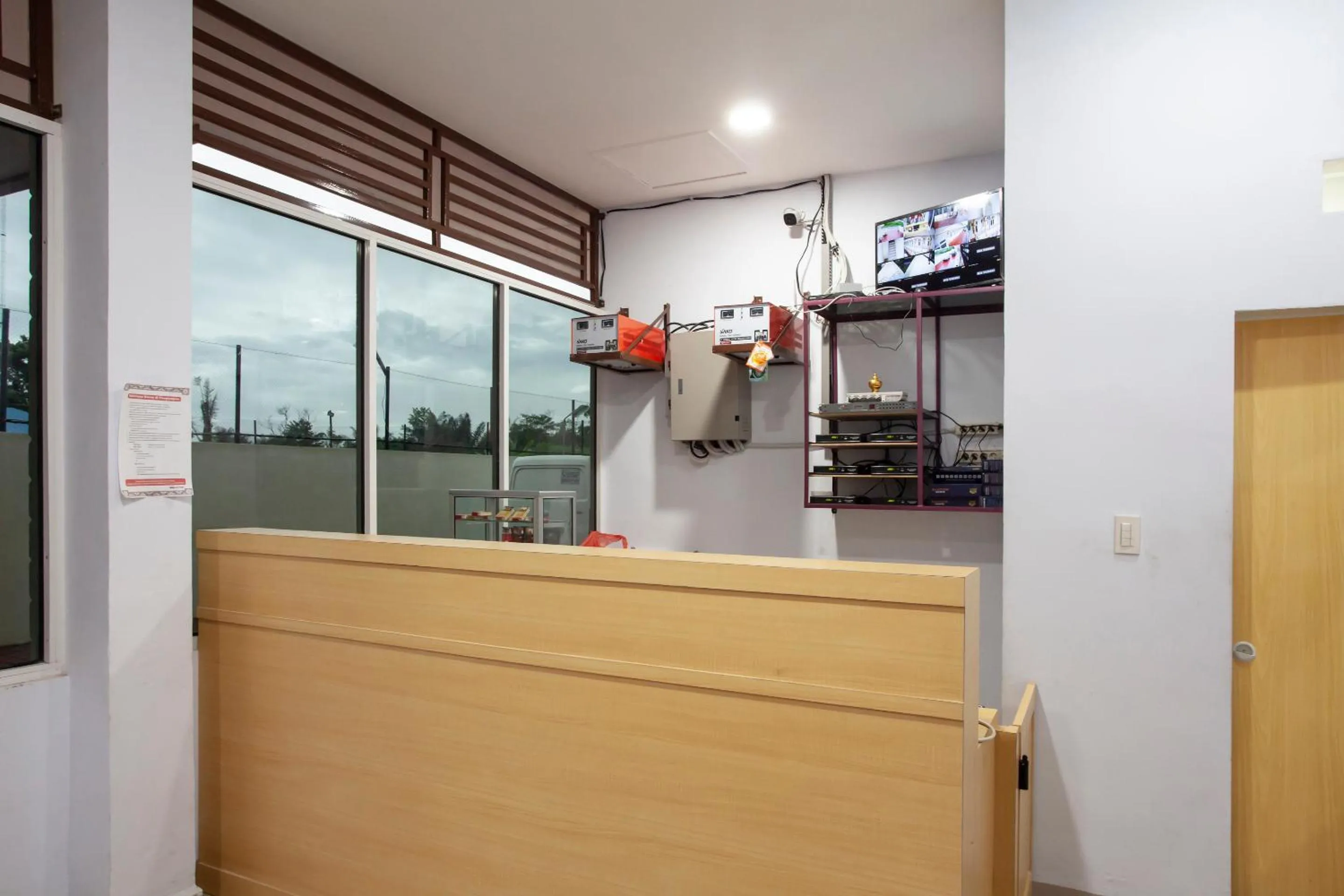 Lobby or reception in OYO 1764 Sopou Penginapan Rinal & Tuah