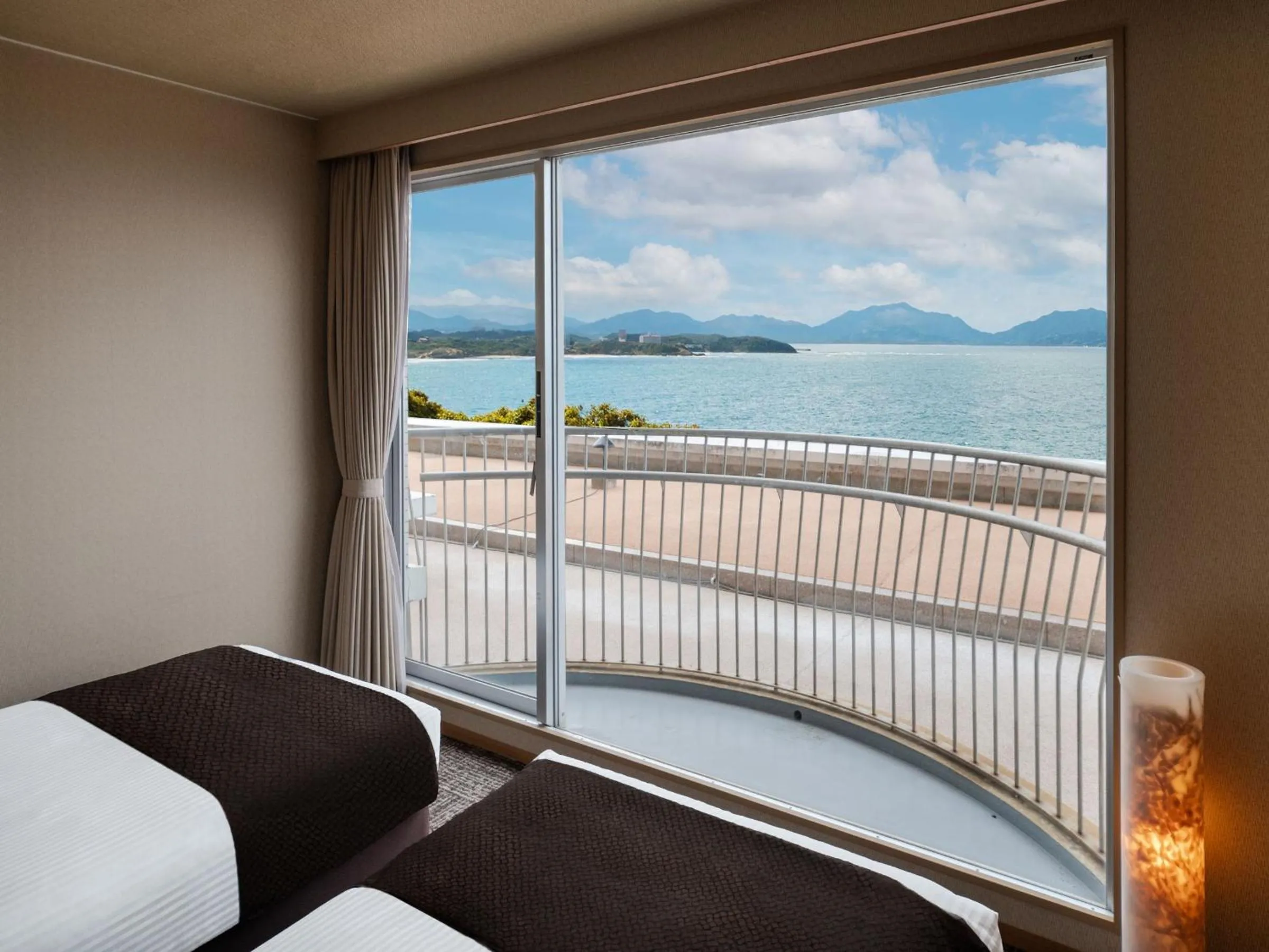 Photo of the whole room, Bed in KAMENOI HOTEL Genkainada