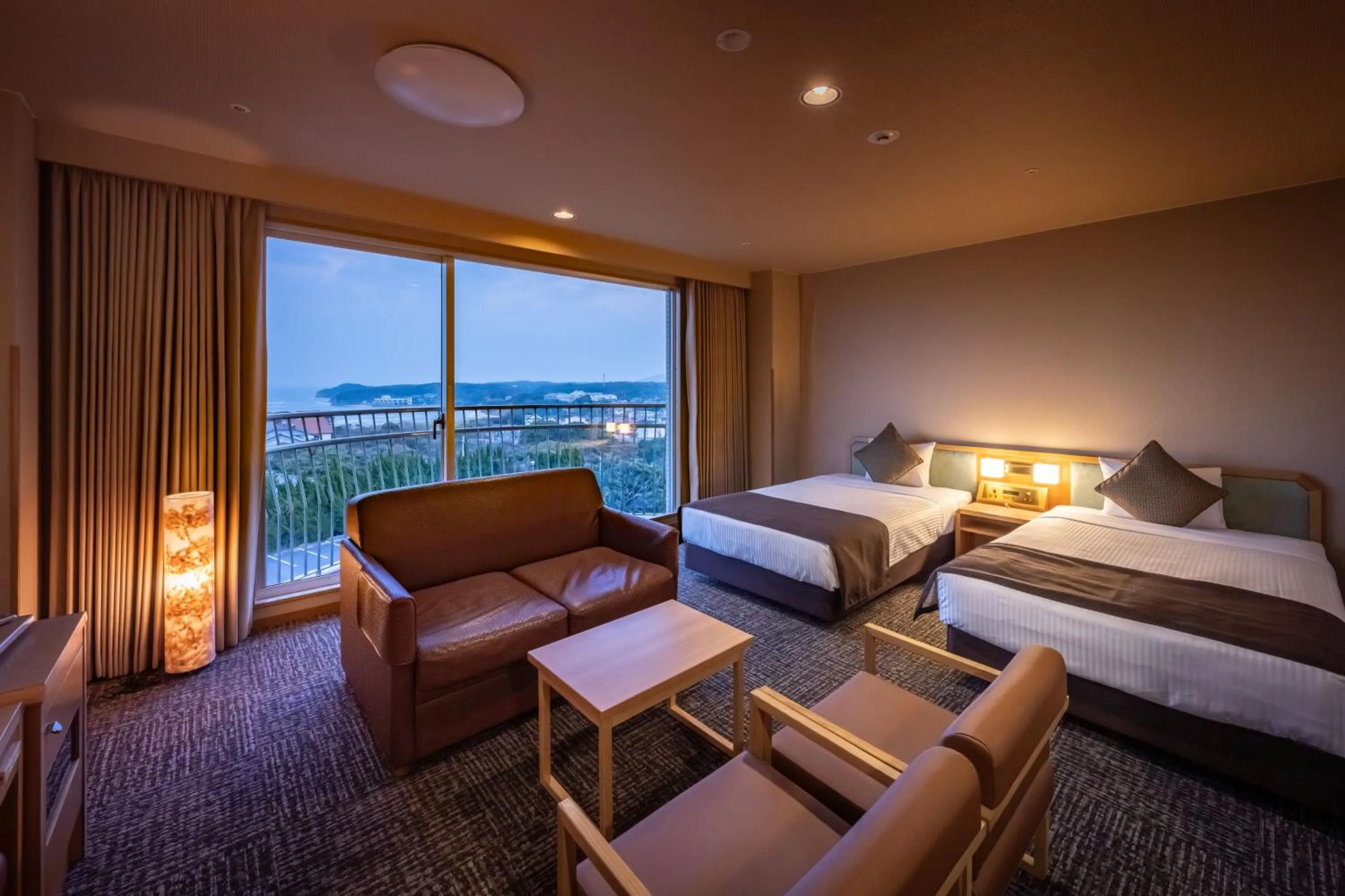 Bed in KAMENOI HOTEL Genkainada