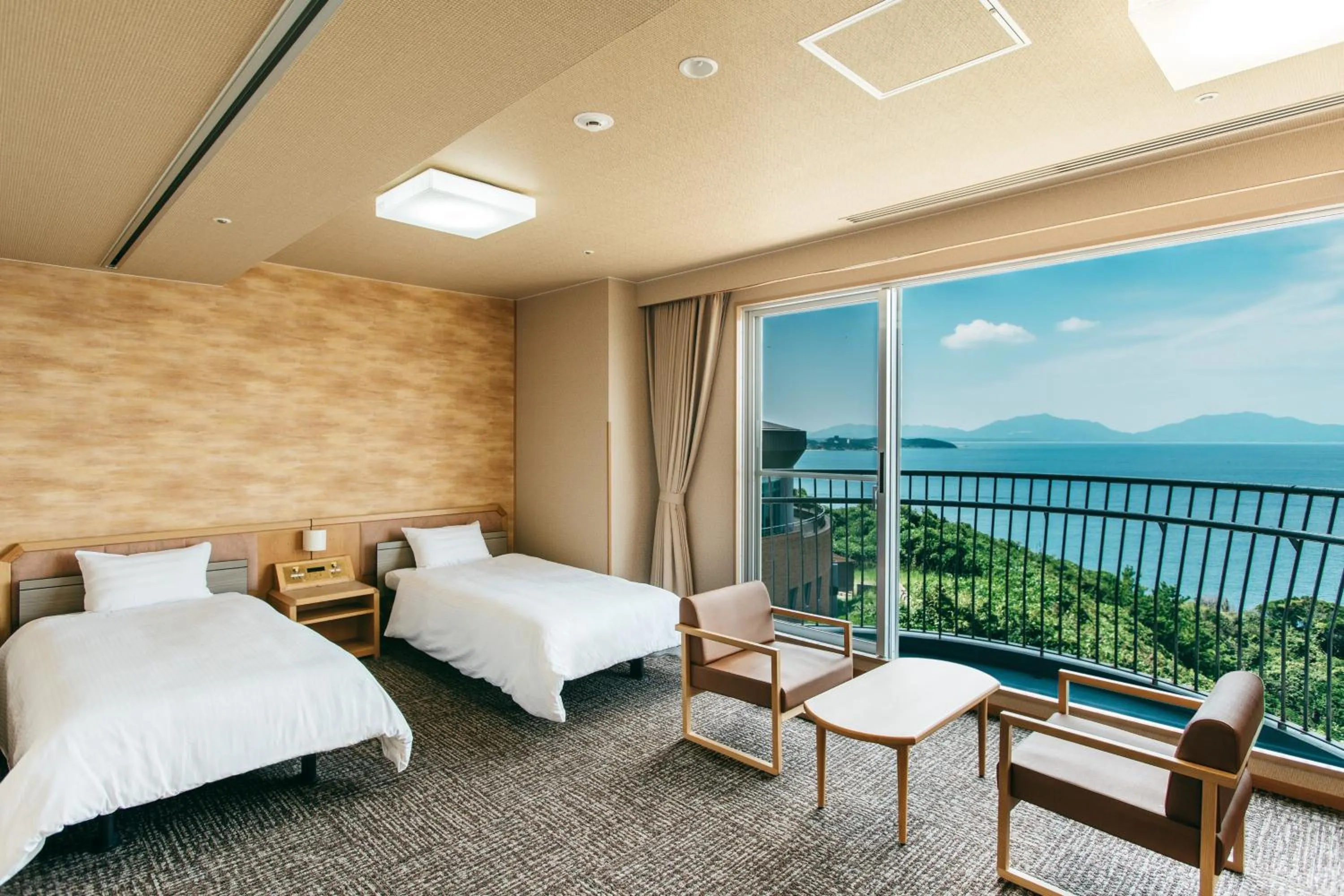 Photo of the whole room, Bed in KAMENOI HOTEL Genkainada