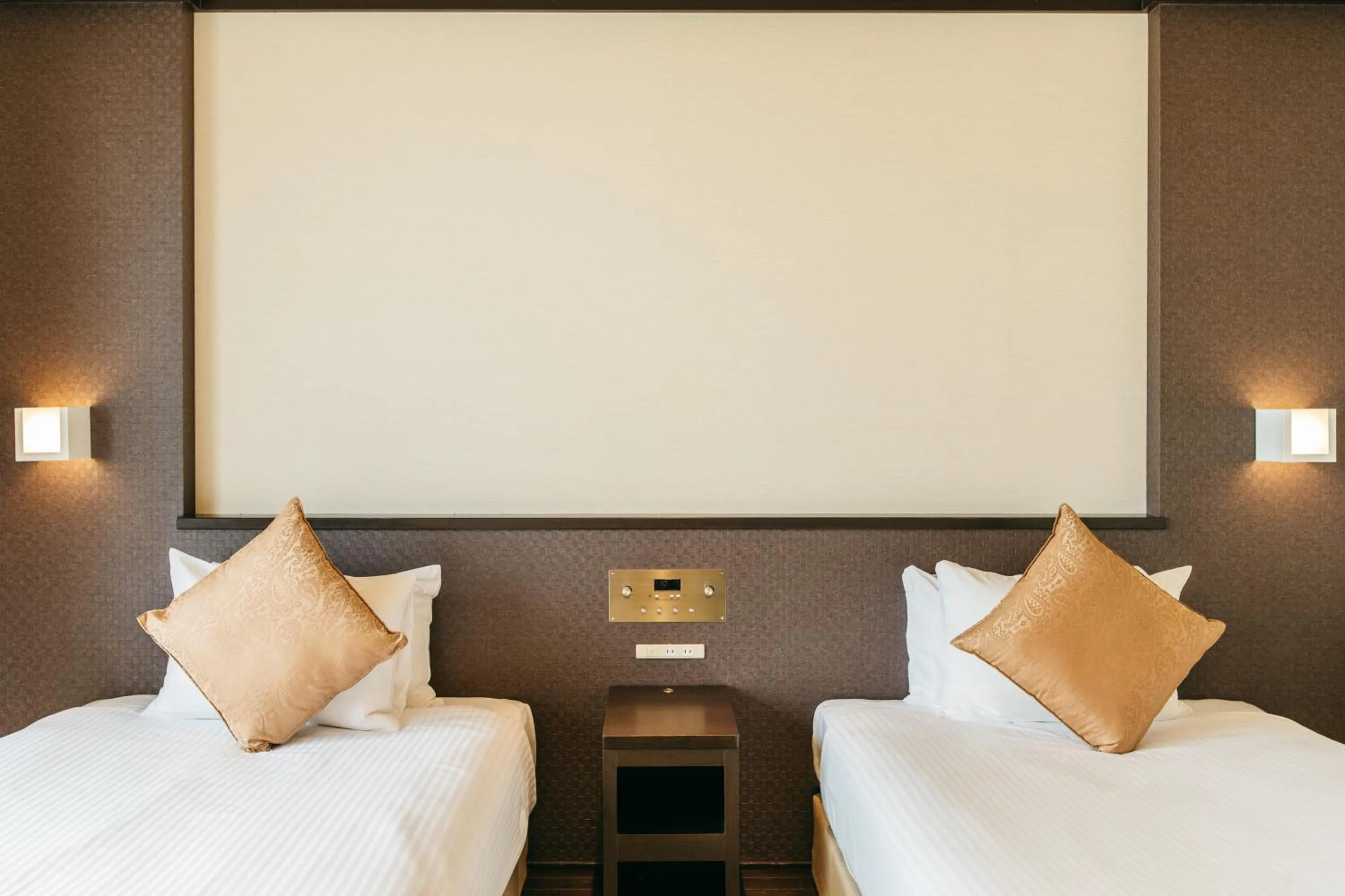 Bed in KAMENOI HOTEL Genkainada