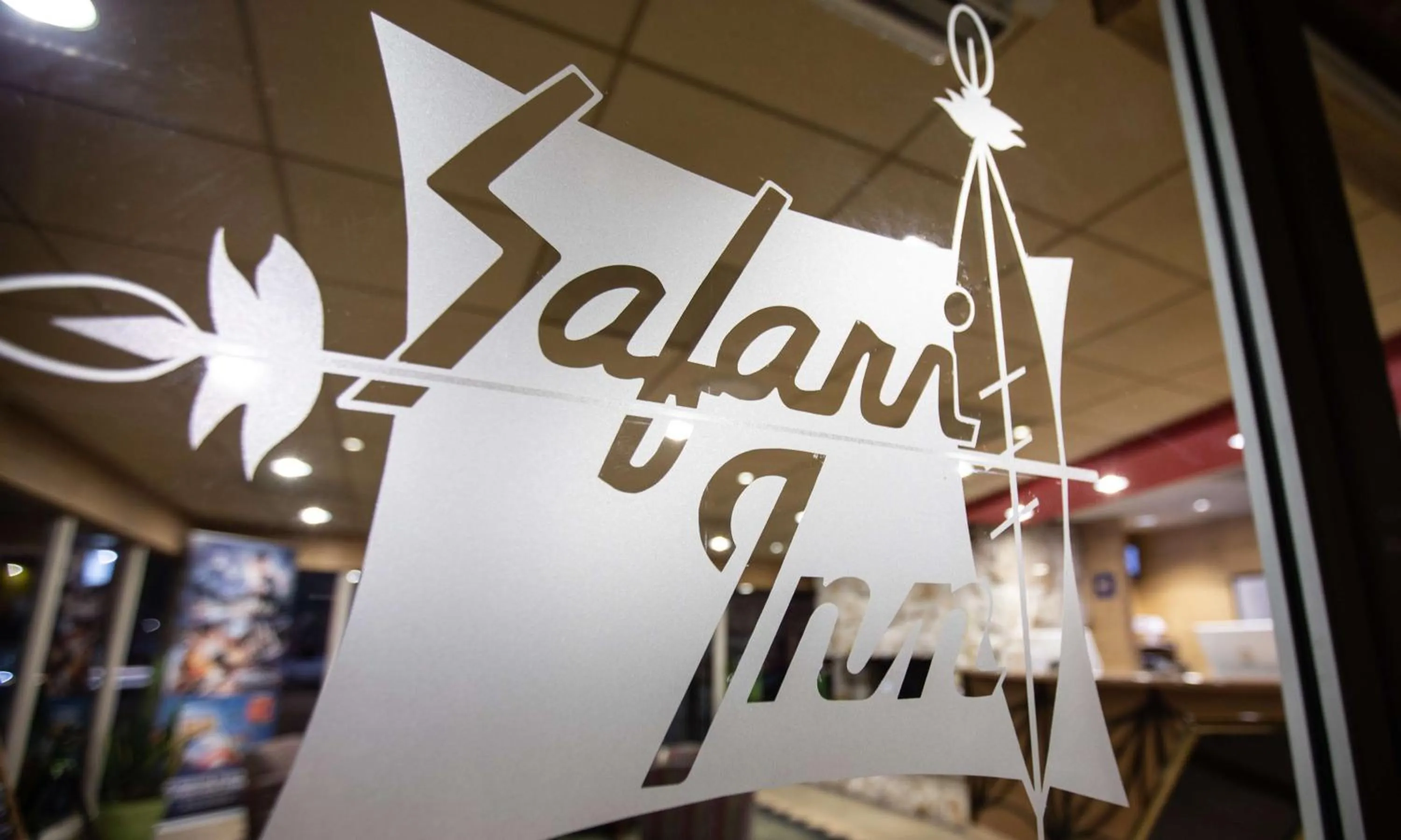 Property building in Safari Inn, a Coast Hotel