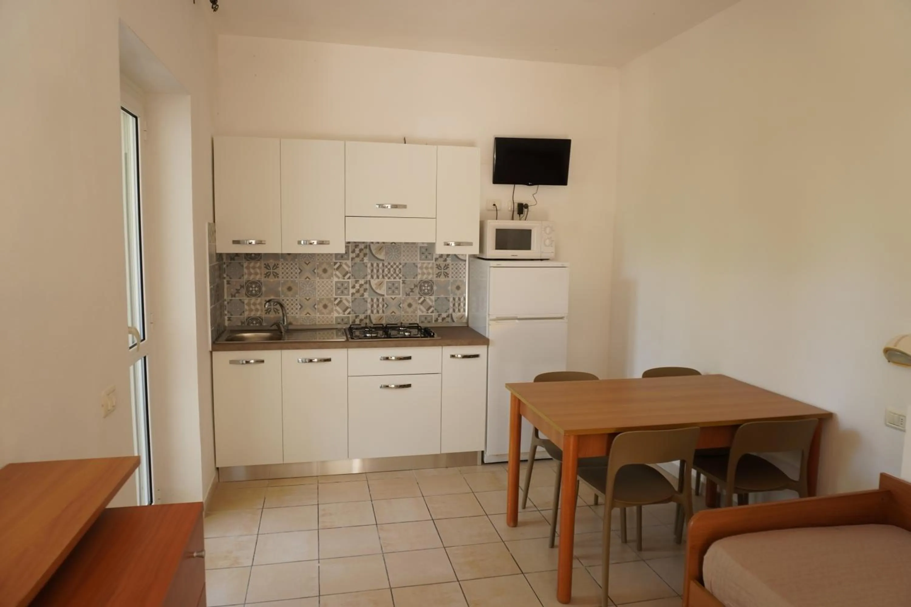 Kitchen or kitchenette in Residence Il Falco