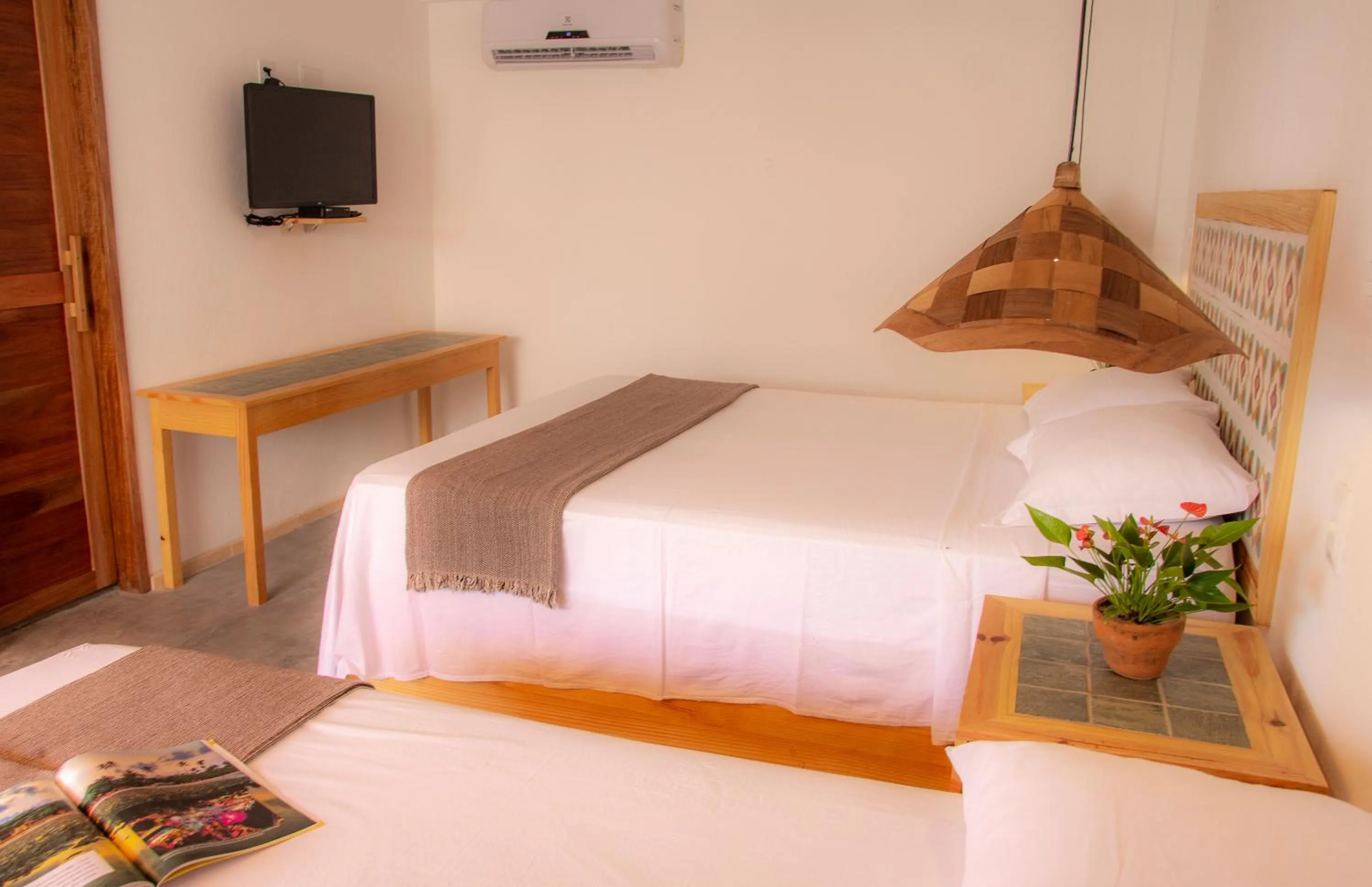 Bed in Pousada Chez Toi