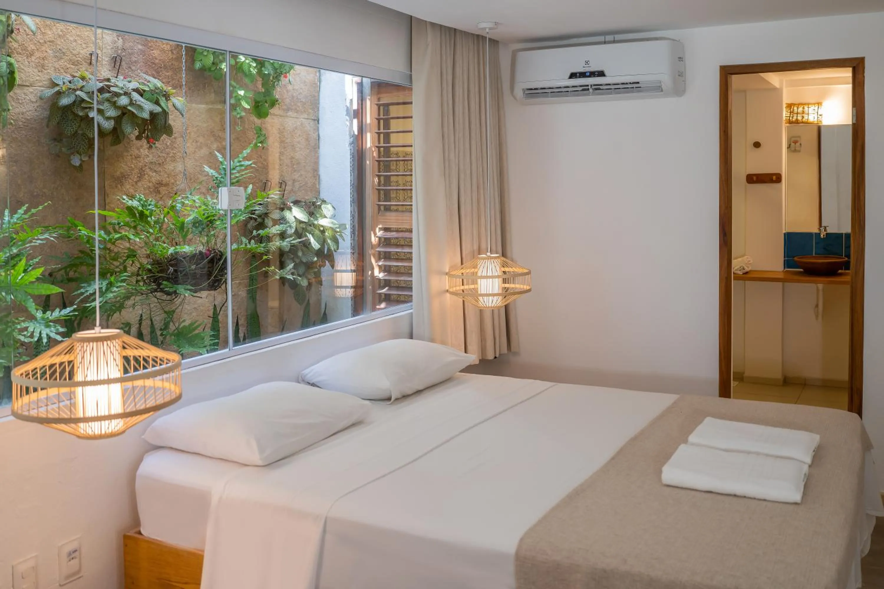 Bed in Pousada Chez Toi