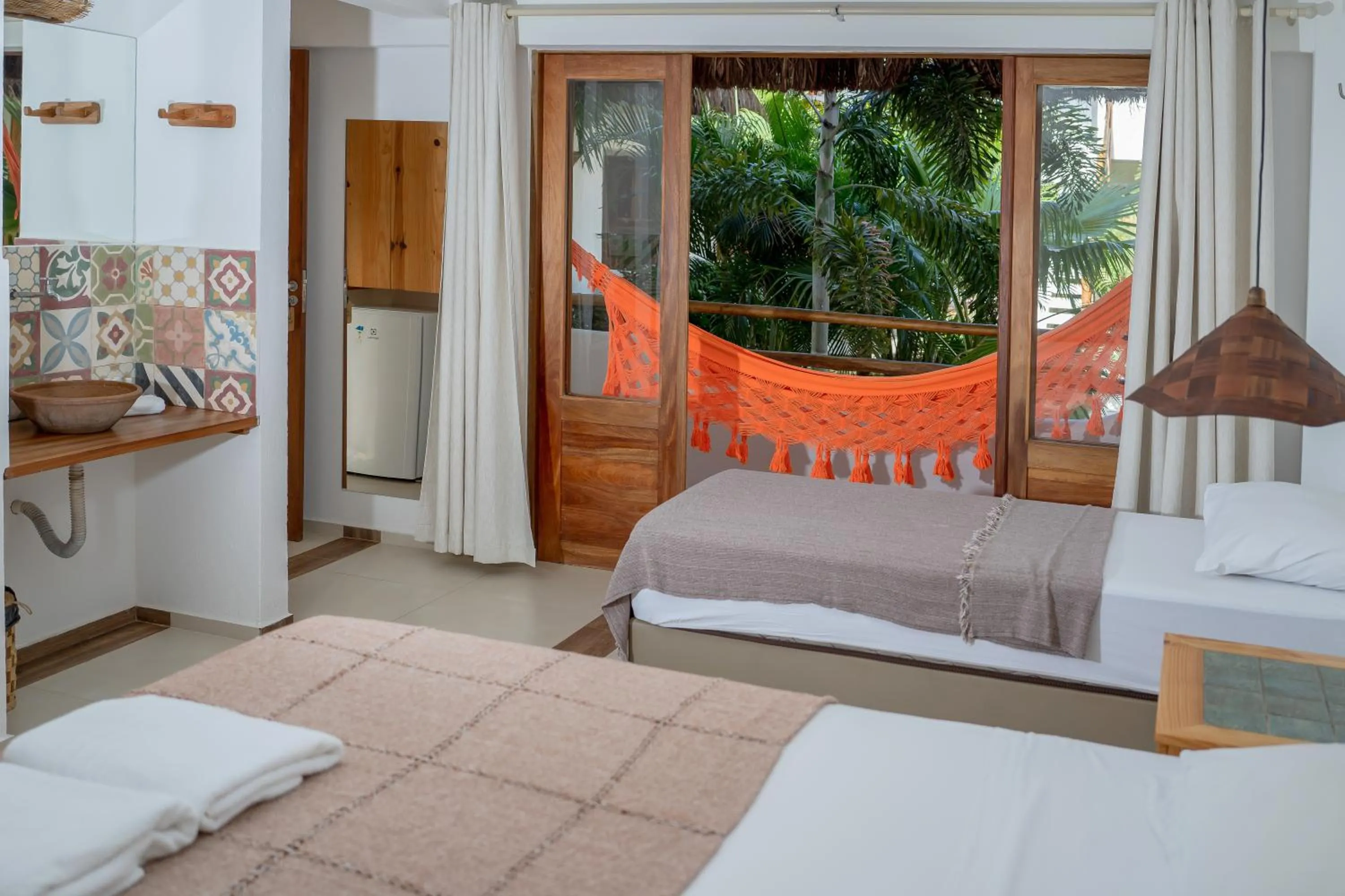 Bed in Pousada Chez Toi