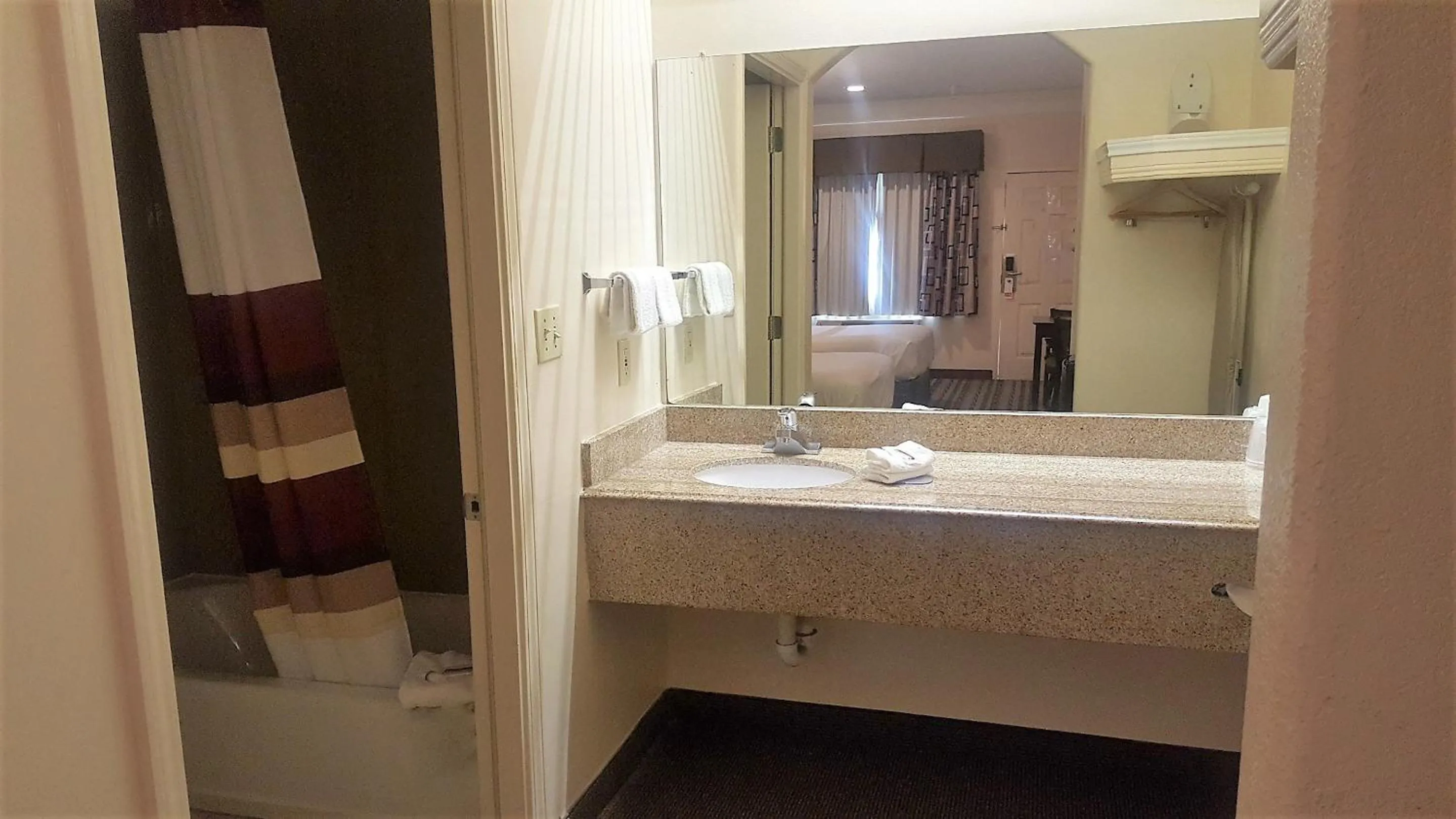 Bathroom in Red Roof Inn & Suites Houston – Humble/IAH Airport