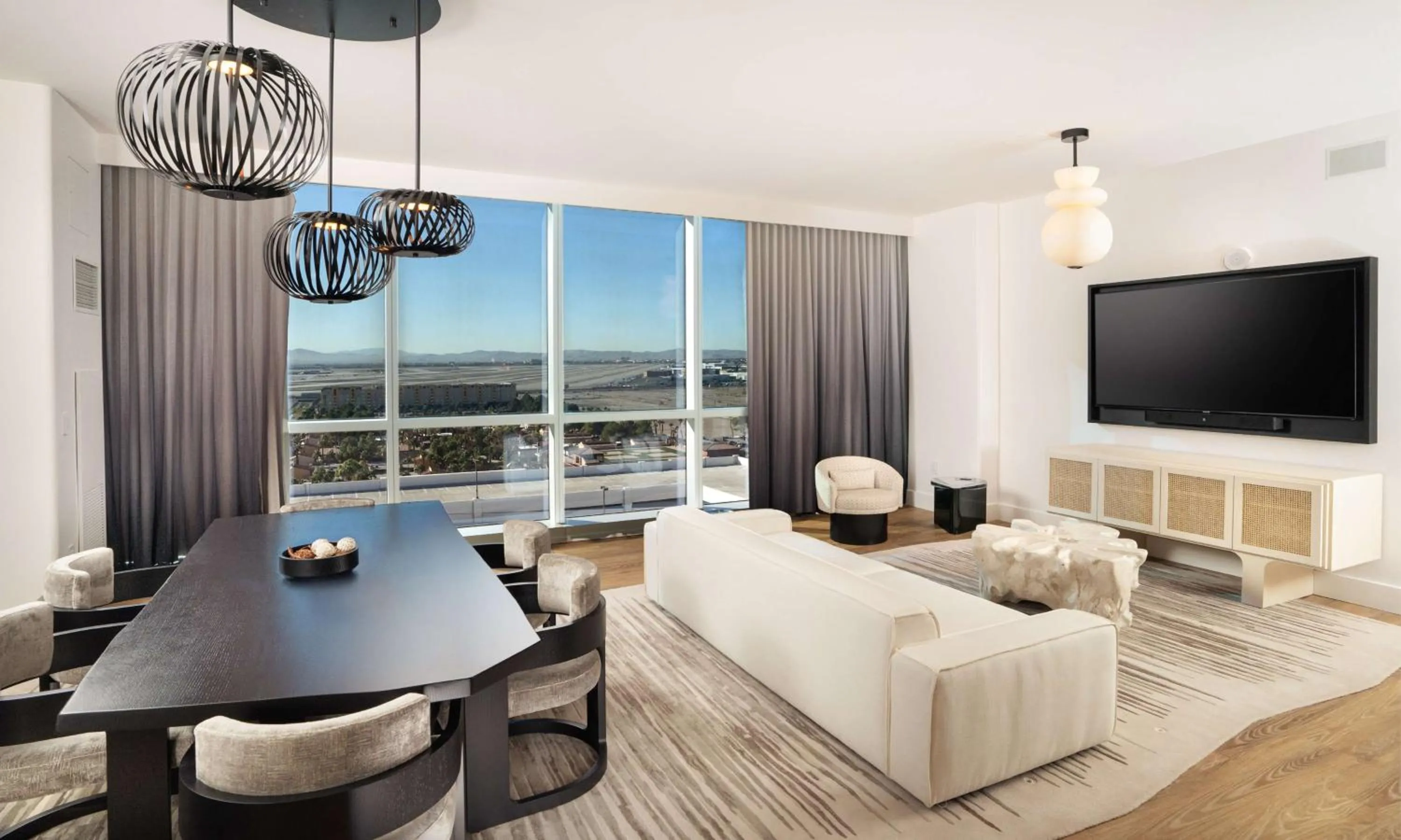 Living room in Virgin Hotels Las Vegas, Curio Collection by Hilton