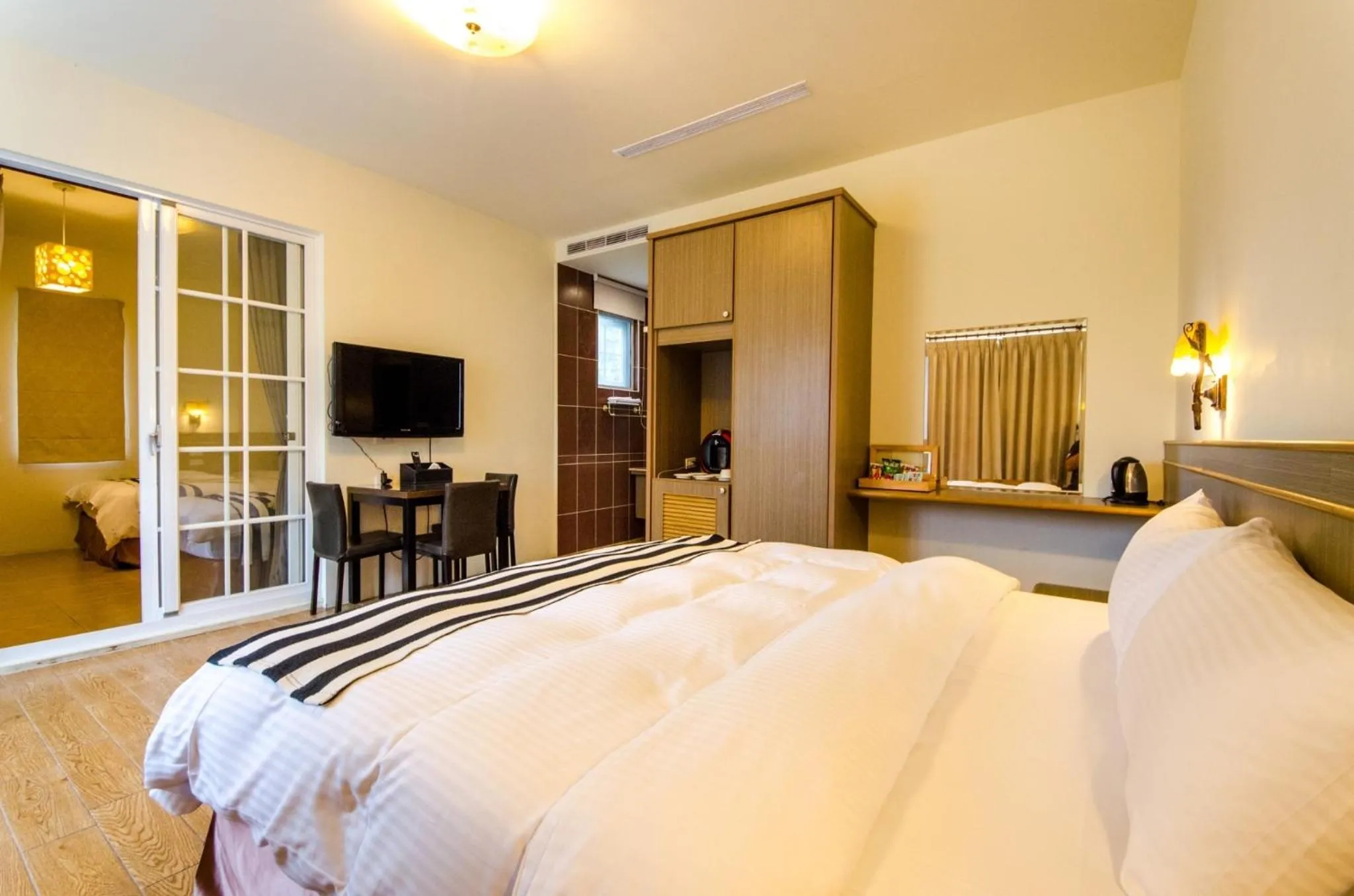 Bed in Butchard Villas