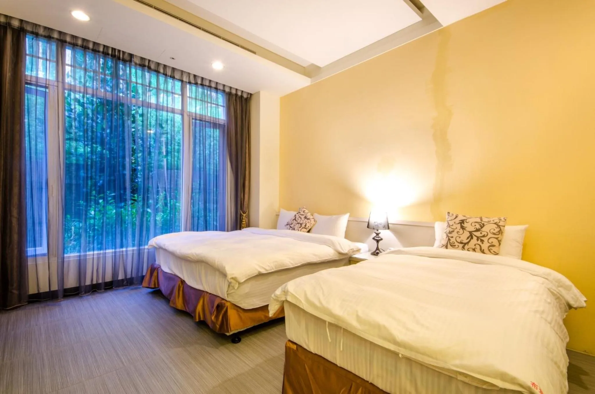 Bed in Butchard Villas