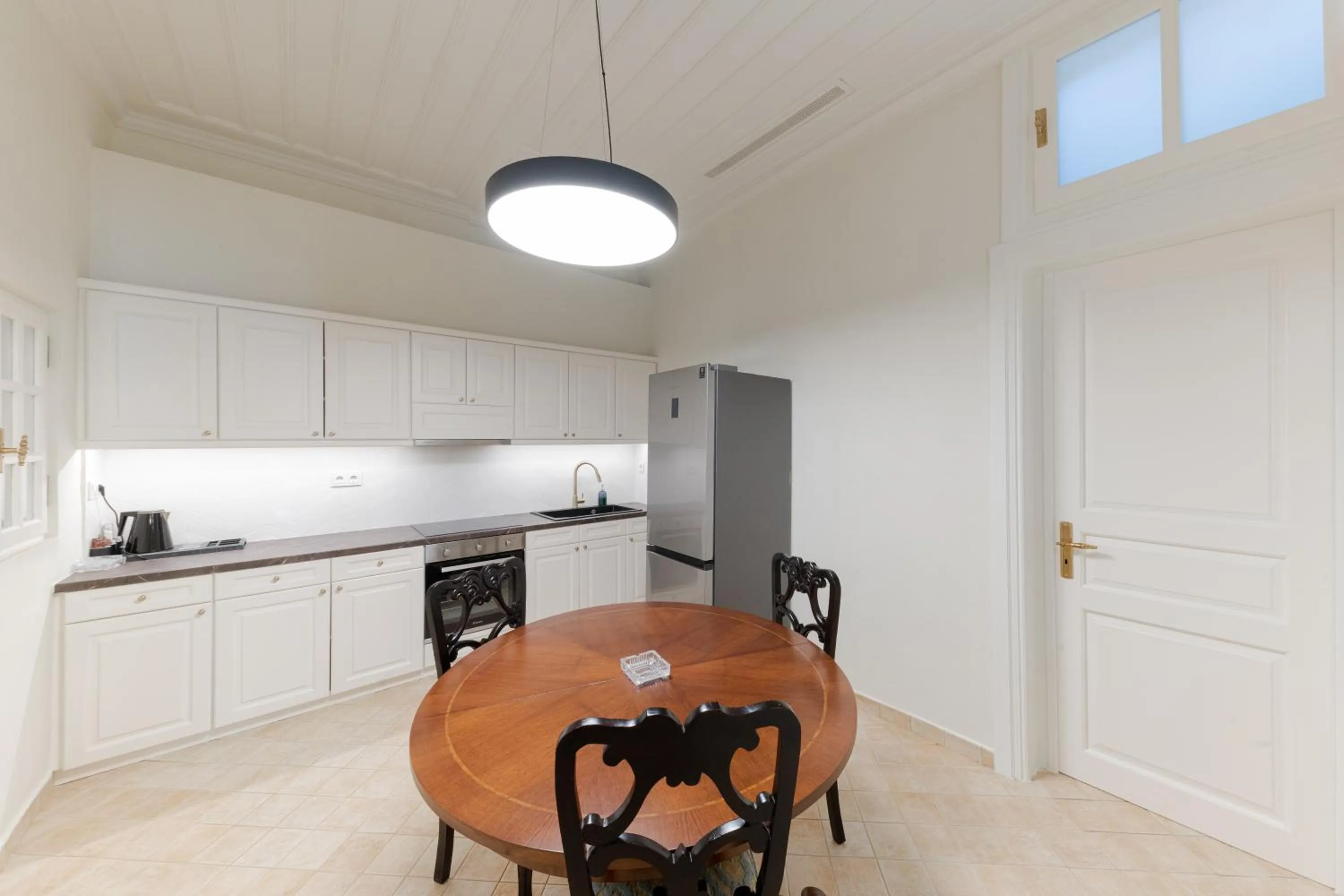 Kitchen or kitchenette in Castellano Hotel & Suites