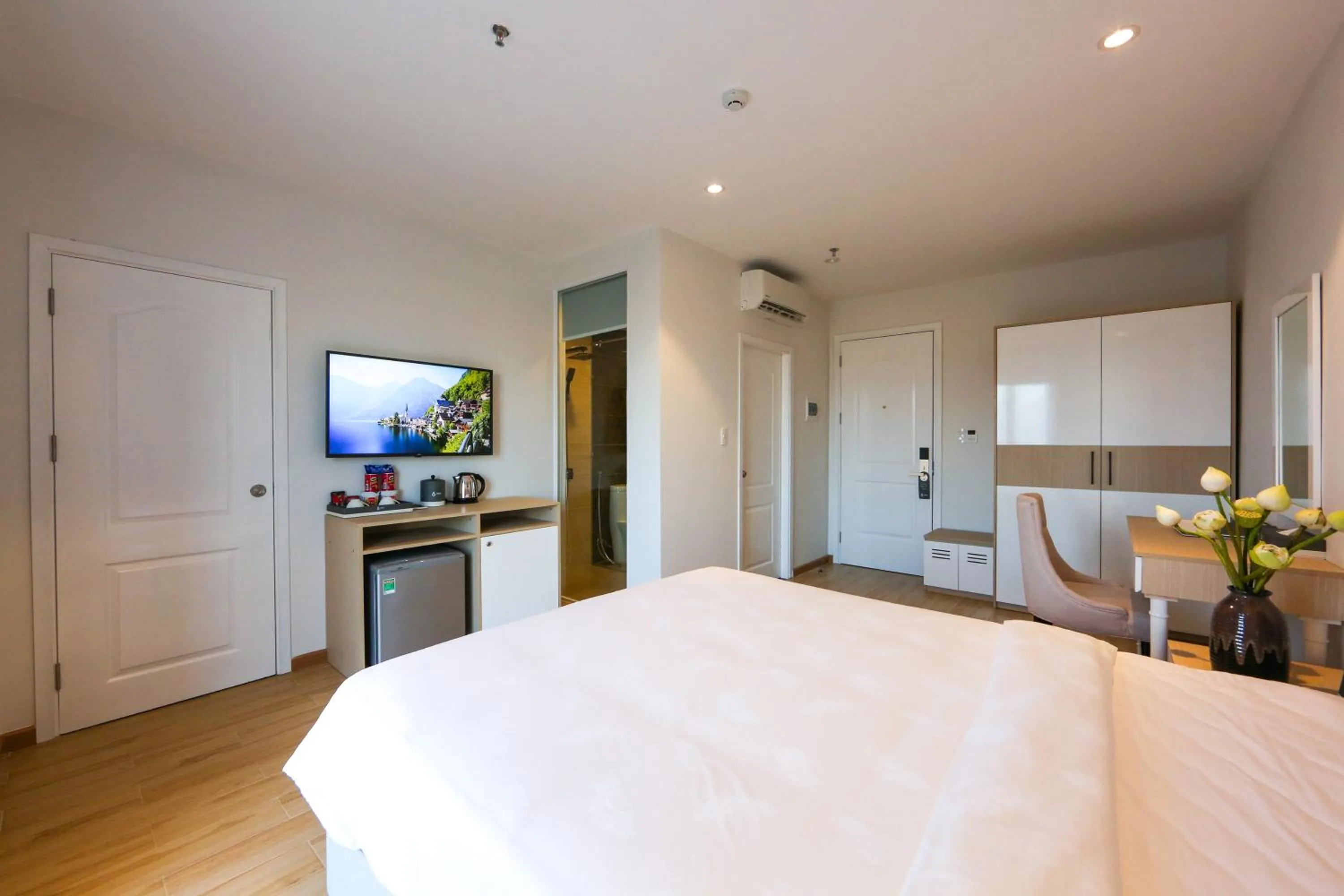 Bed in RHM Luxury Hotel And Suite