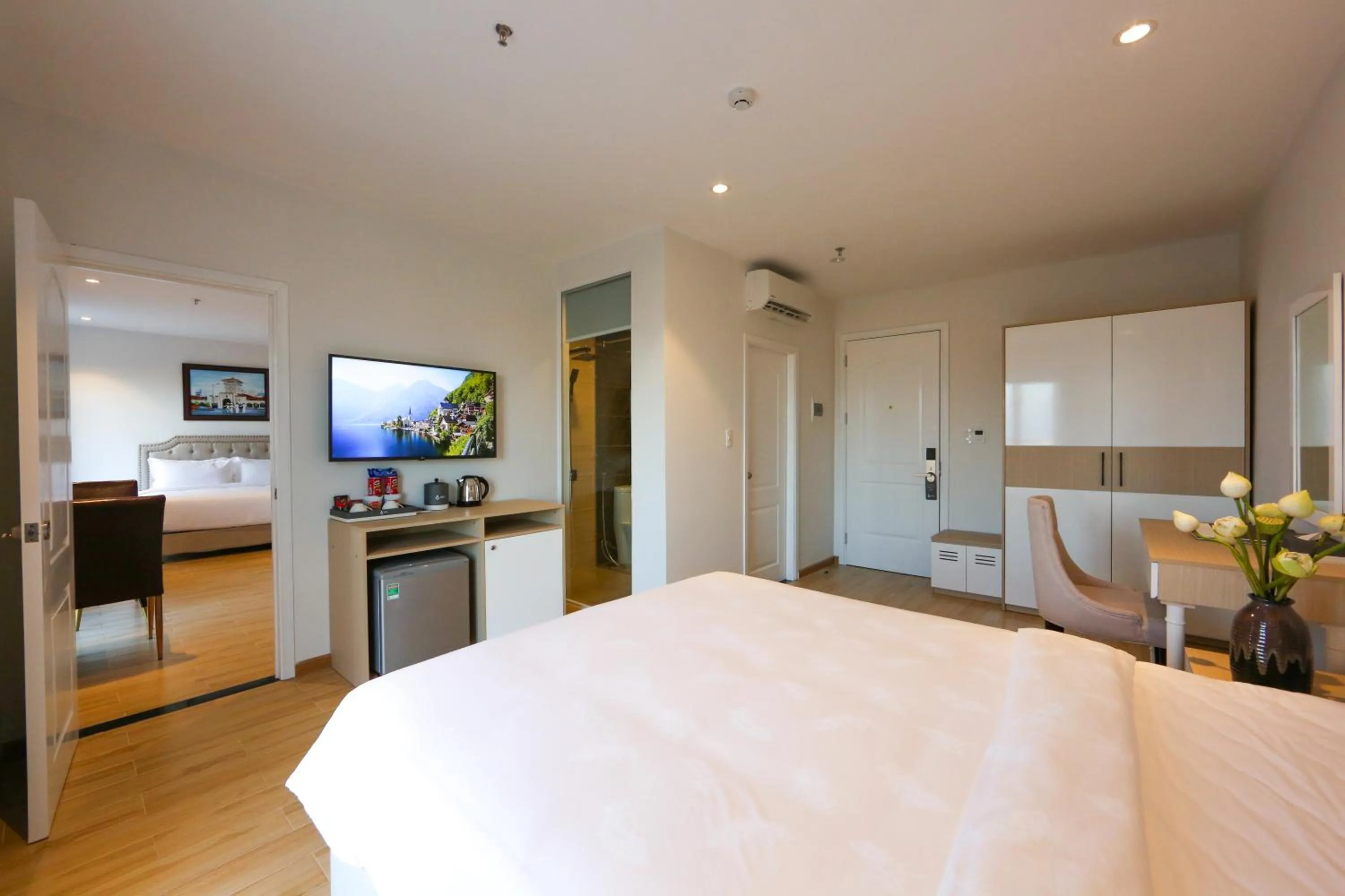 Bed in RHM Luxury Hotel And Suite