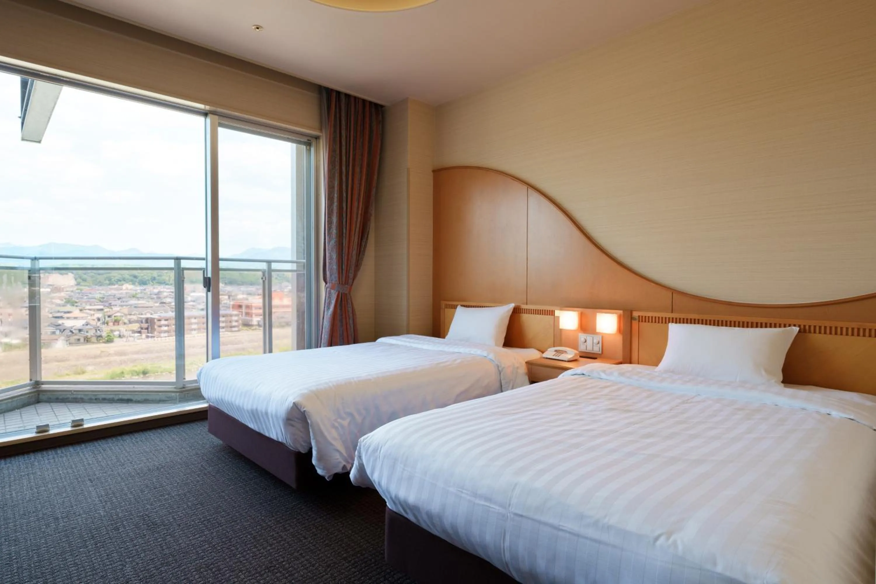 Bed in Hita Tenryosui no Yado