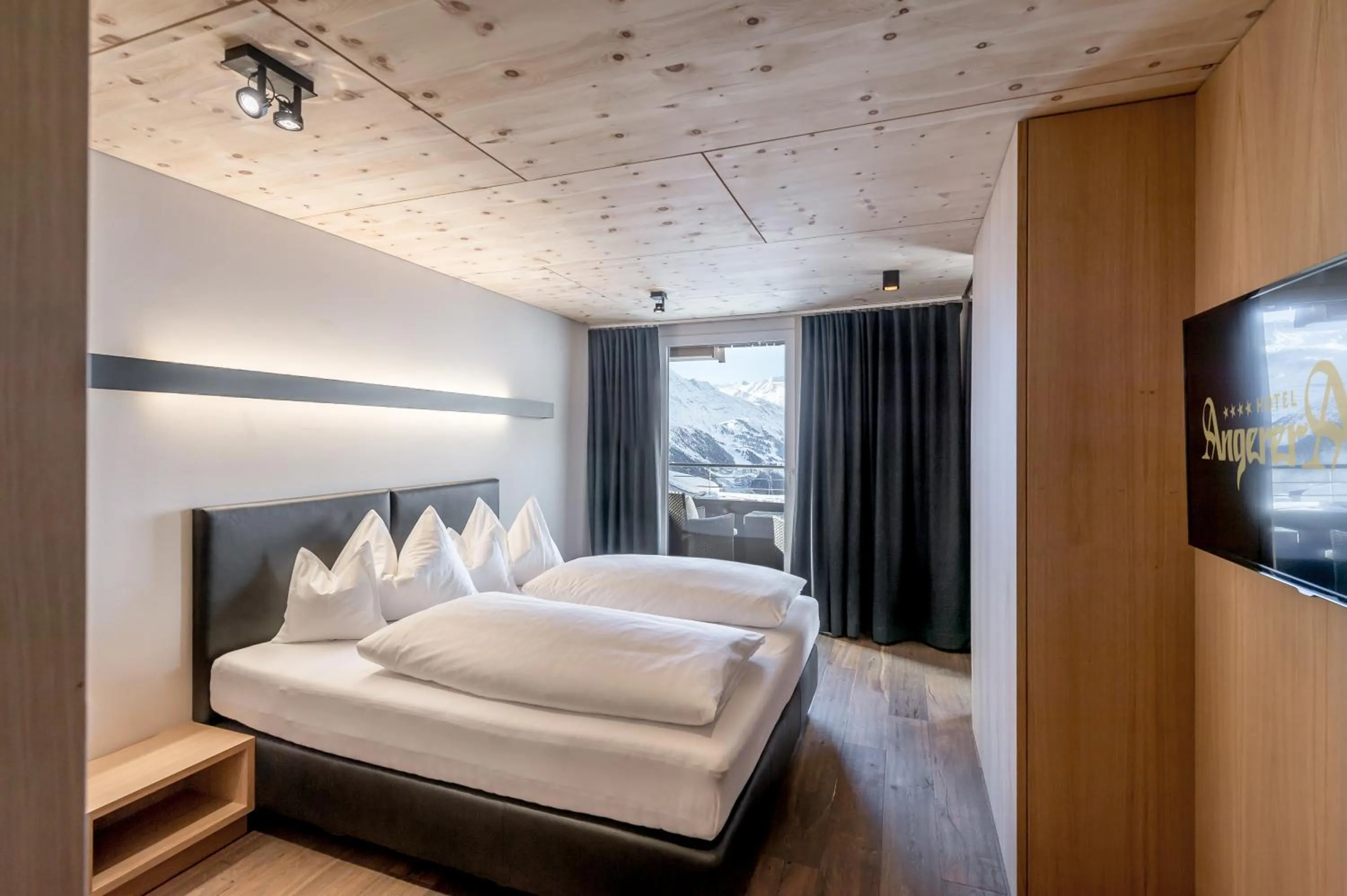 Bed in Hotel Angerer Alm