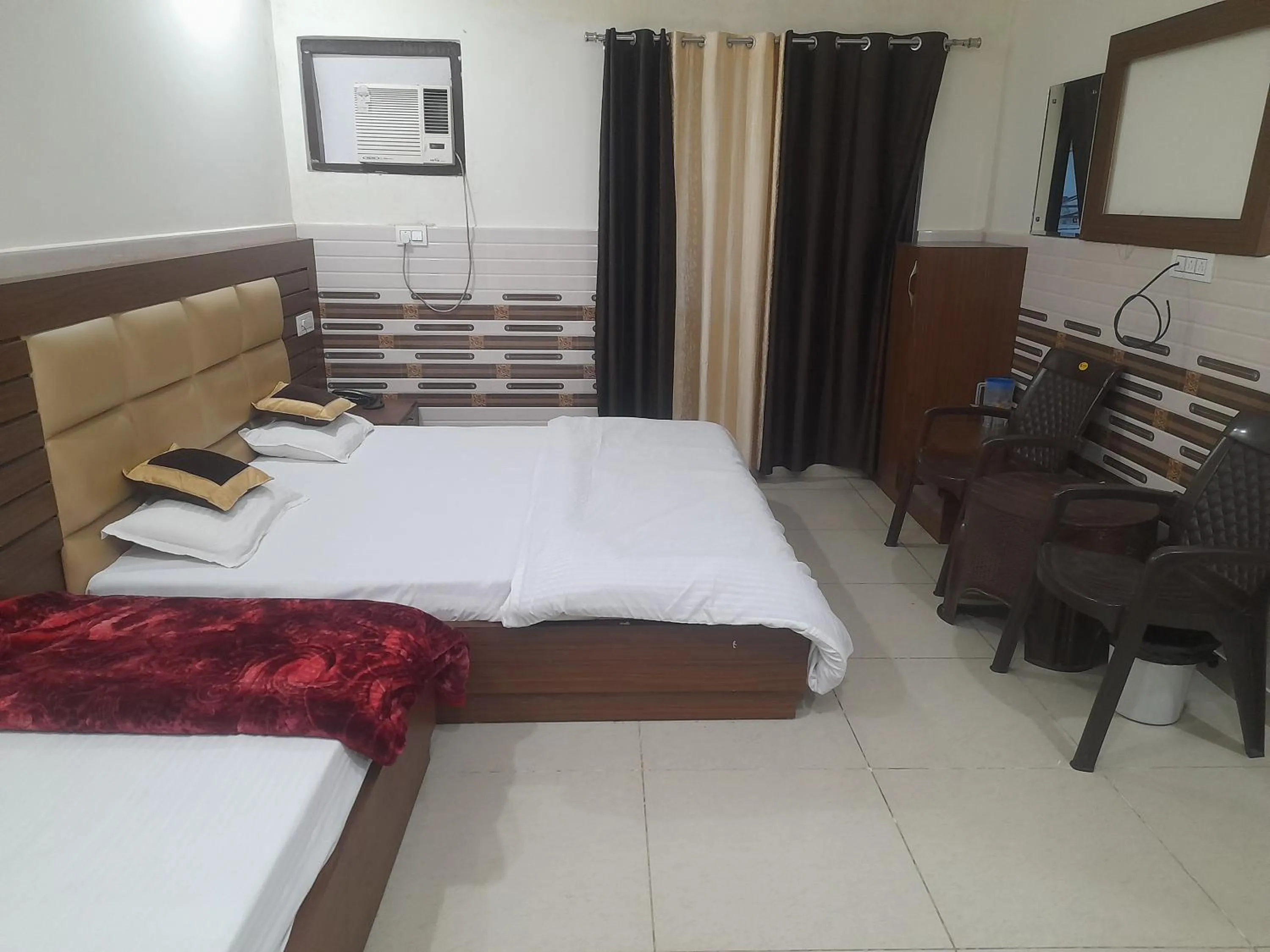 Bed in Abrol residency