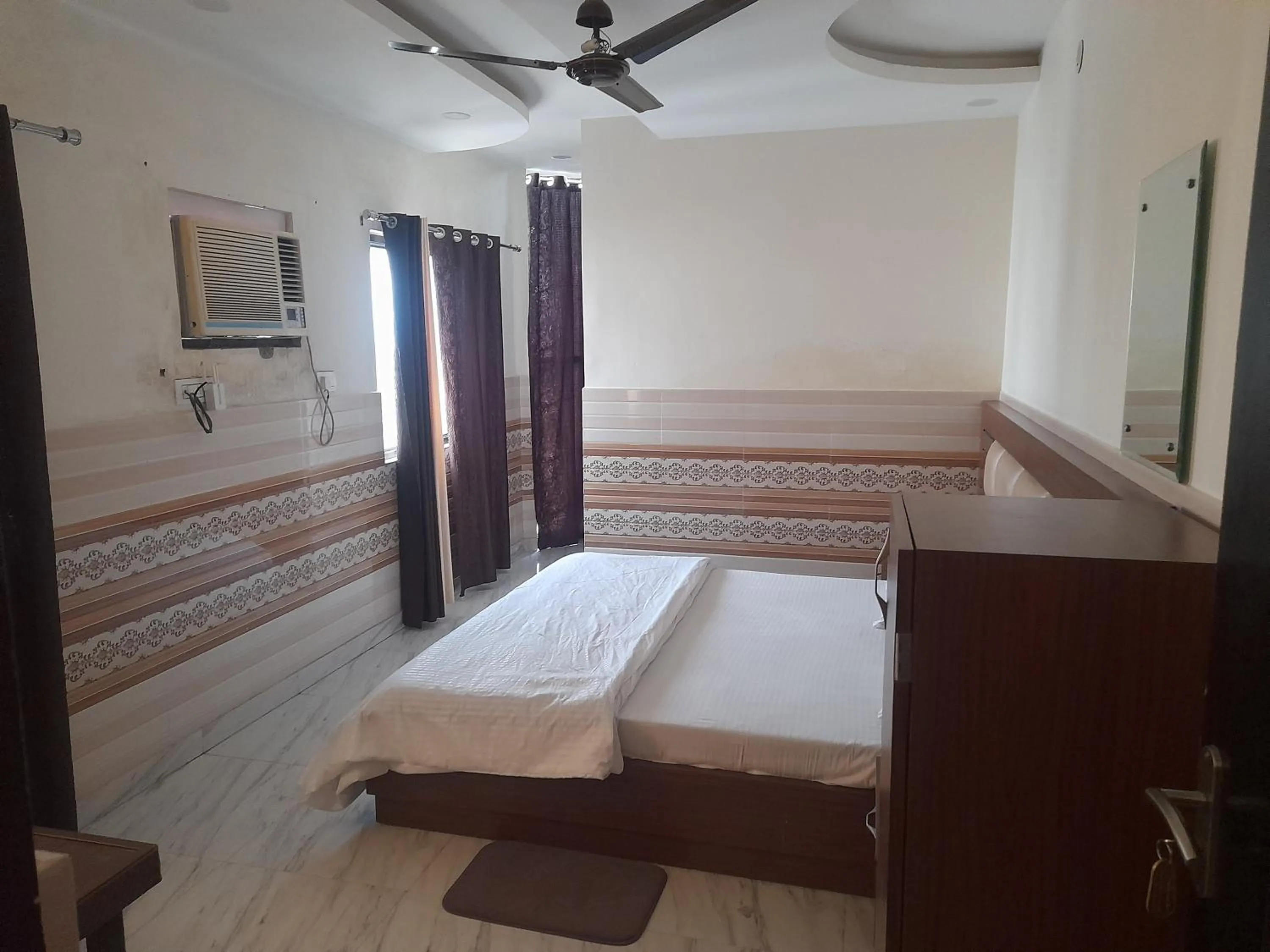 Photo of the whole room, Bed in Abrol residency