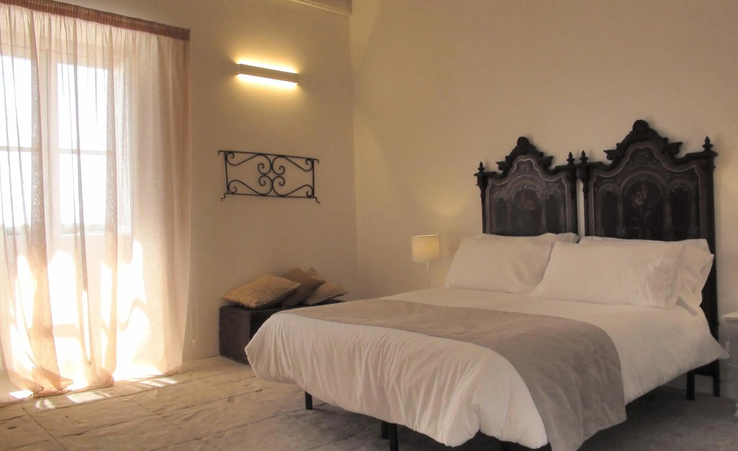 Photo of the whole room, Bed in Baglio Siciliamo Country House