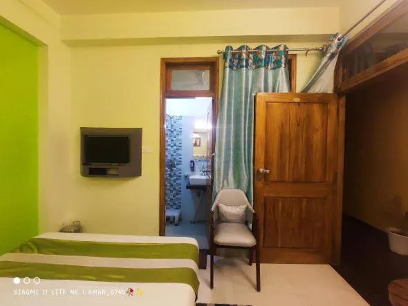 Bed in Hotel Prabhat