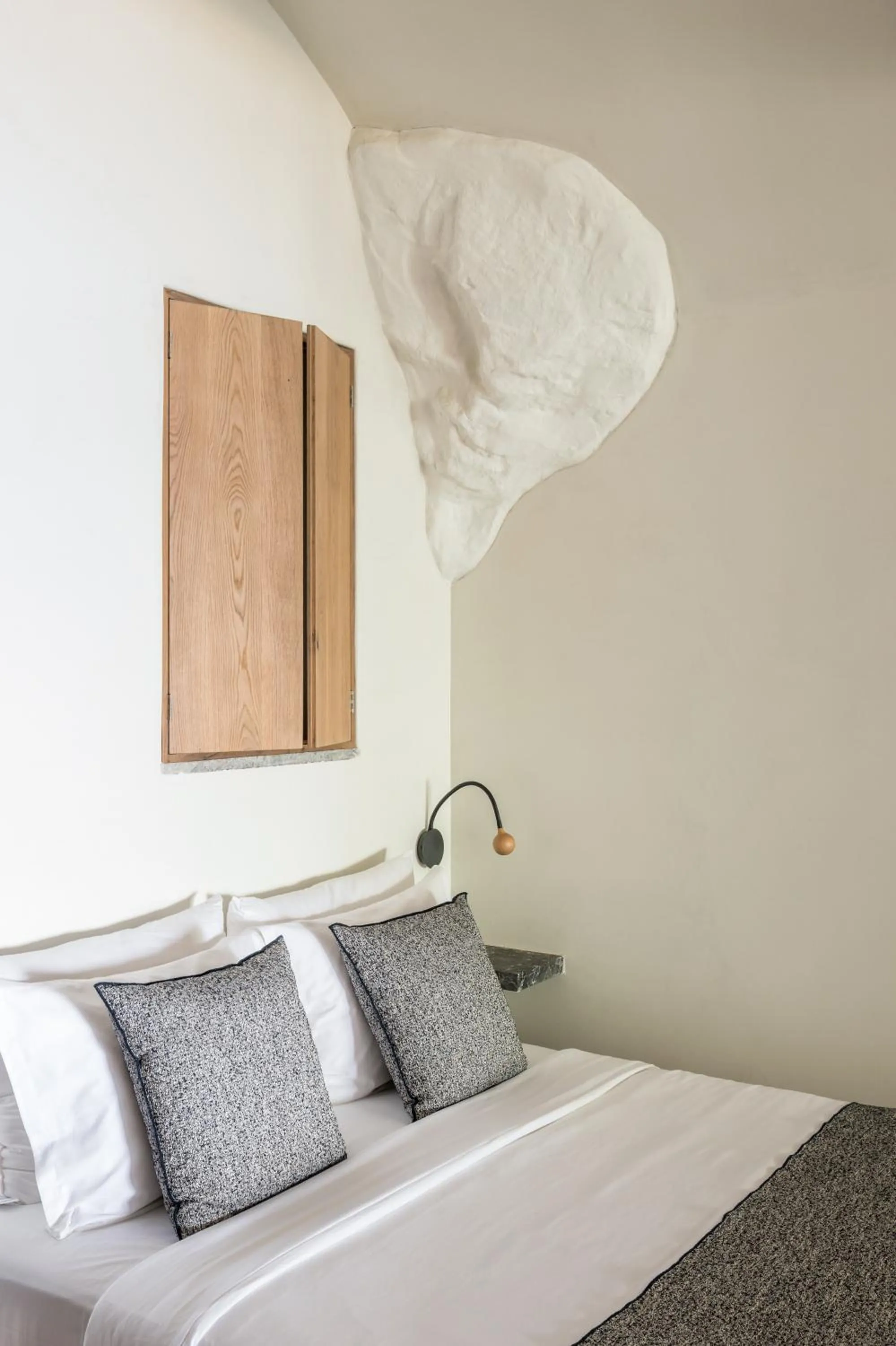 Bed in Acro Suites - A Wellbeing Resort