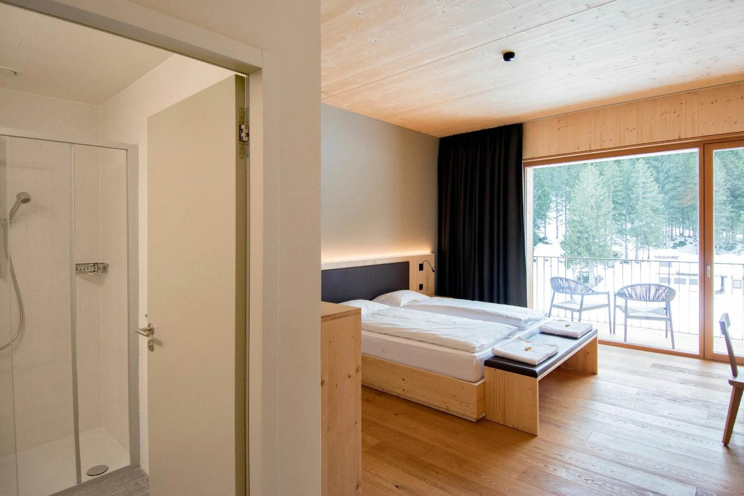Bedroom, Bed in Campra Alpine Lodge & Spa