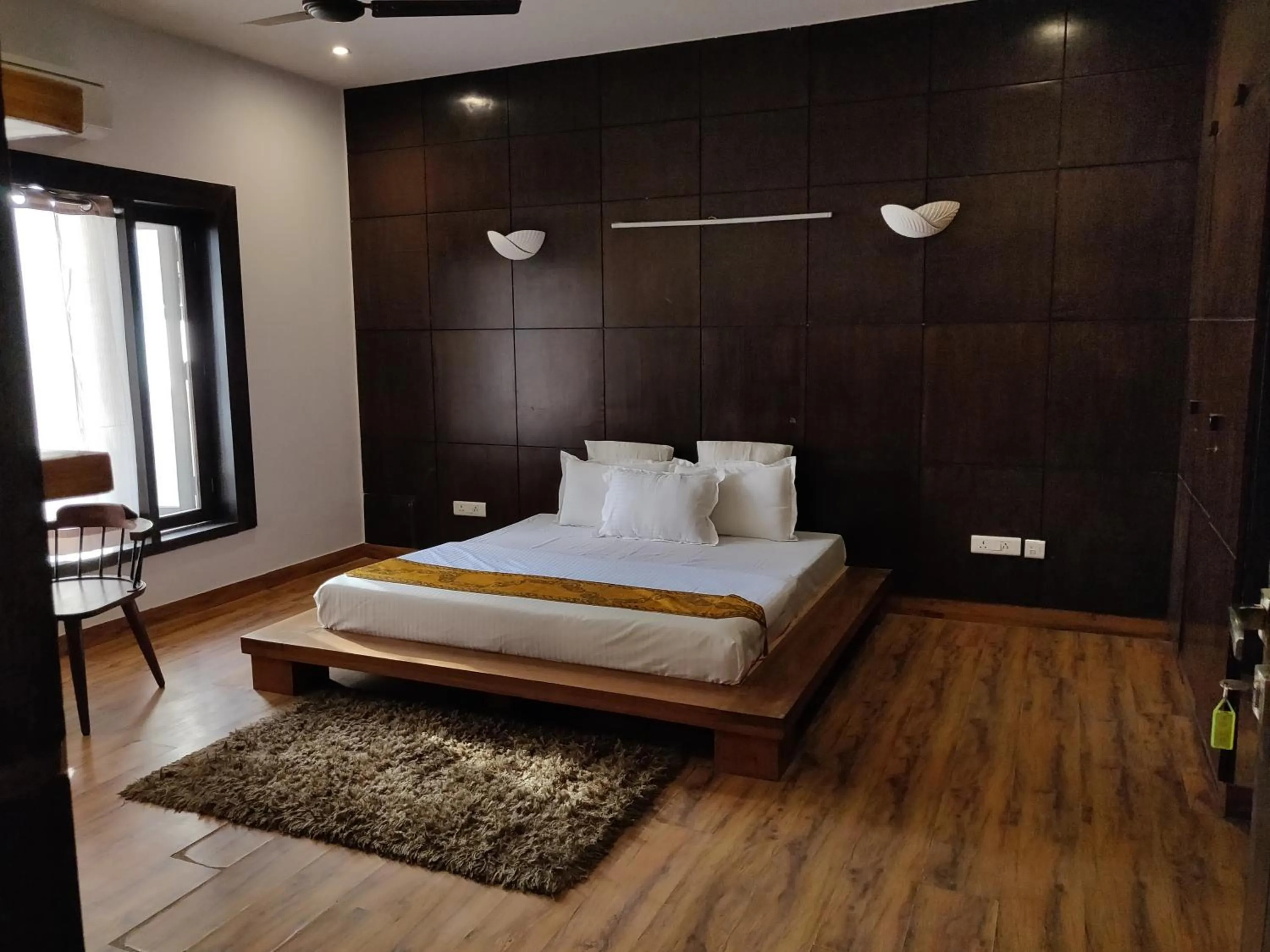 Bedroom, Bed in Aakritii Hotels