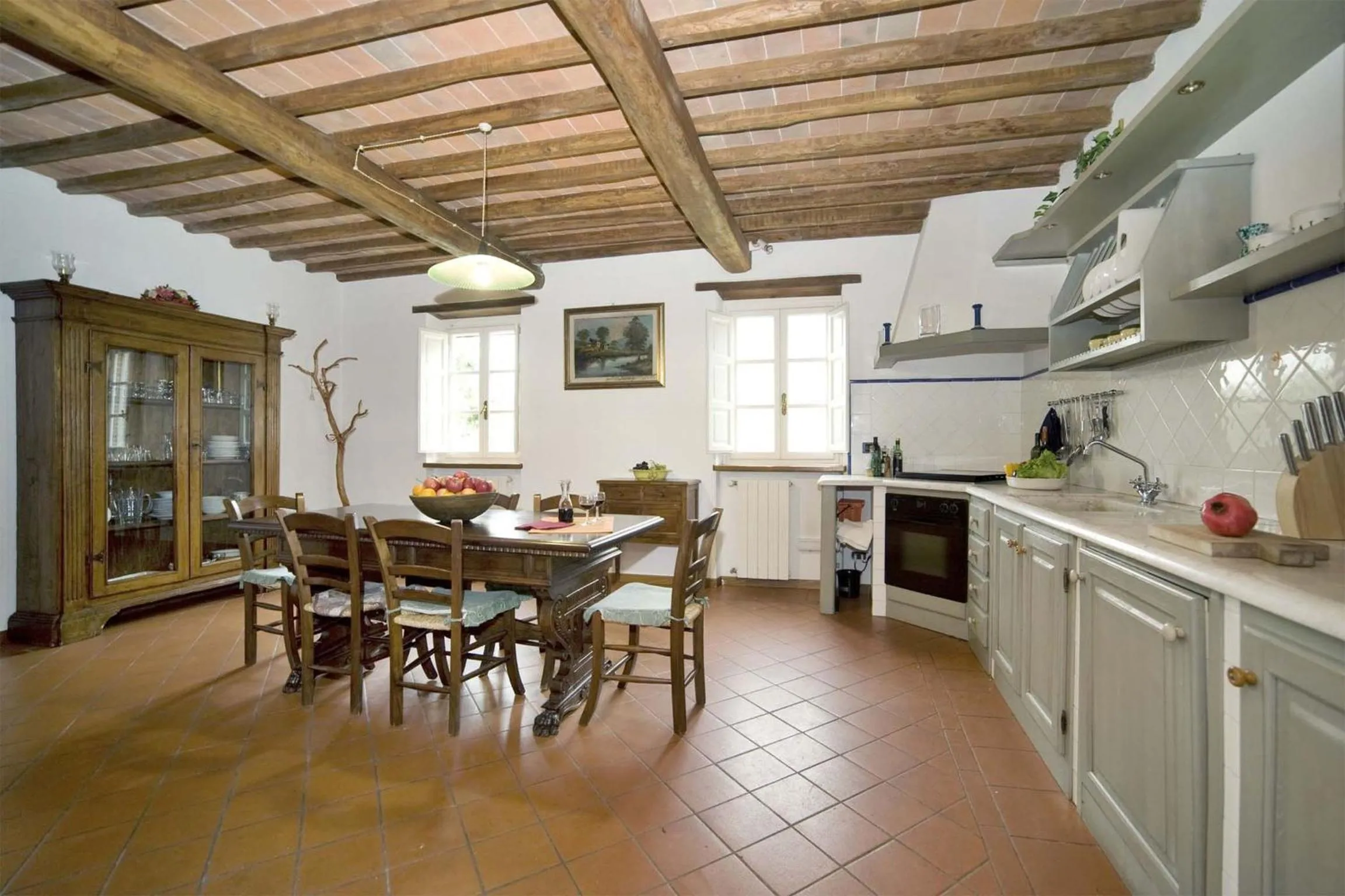 Kitchen or kitchenette in Broccolo by Salogi Villas