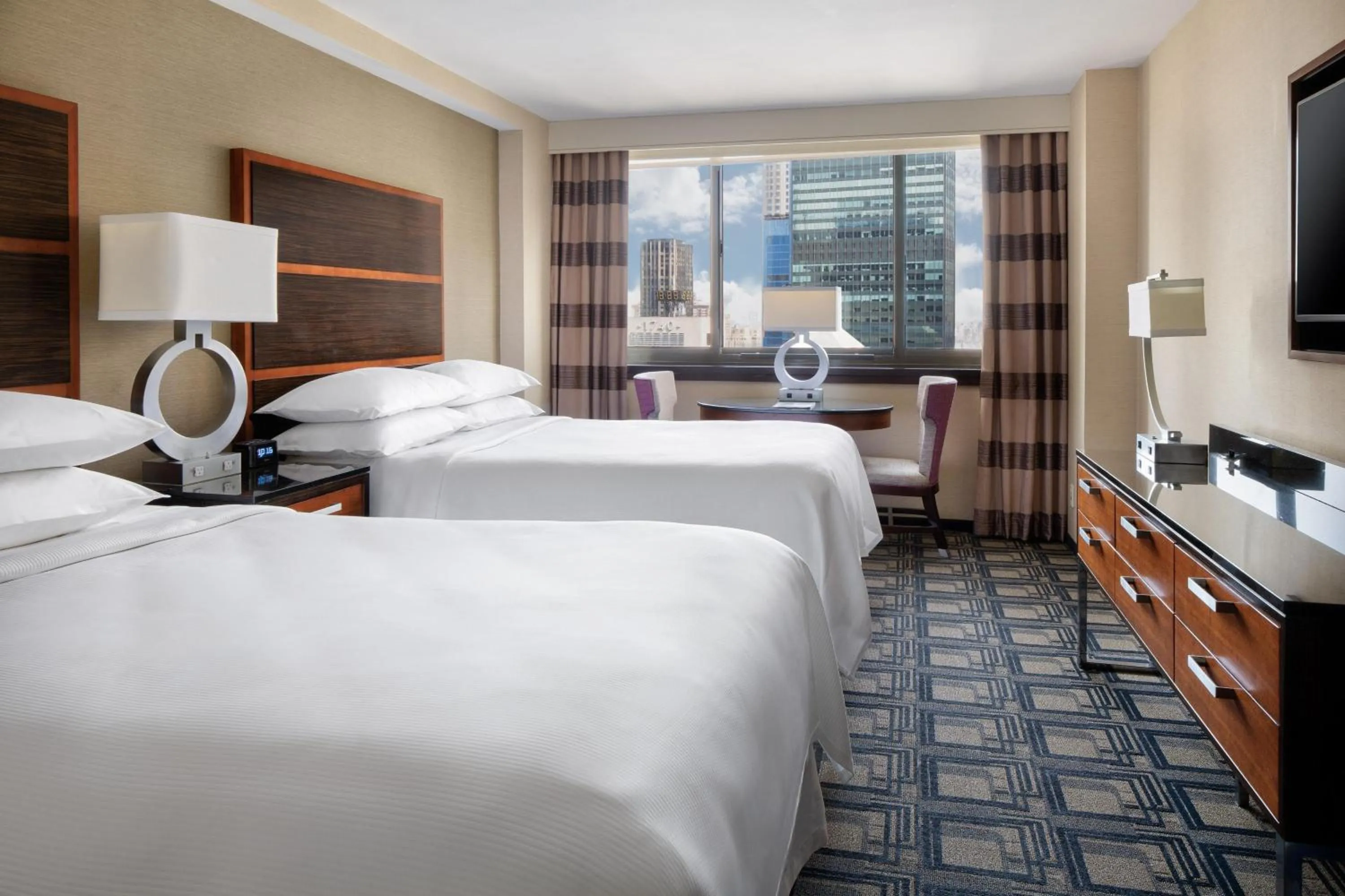 Photo of the whole room, Bed in Sheraton New York Times Square Hotel