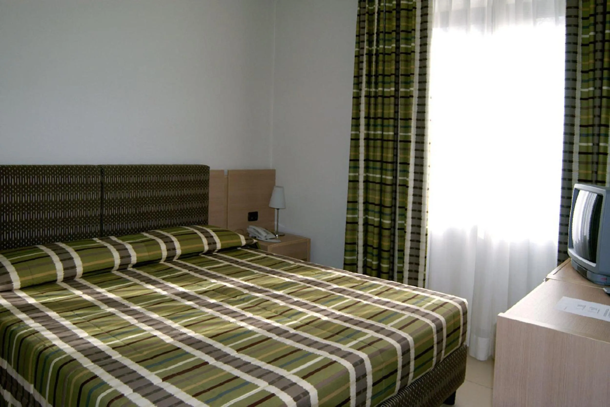 Bedroom, Bed in Hotel Santo Stefano