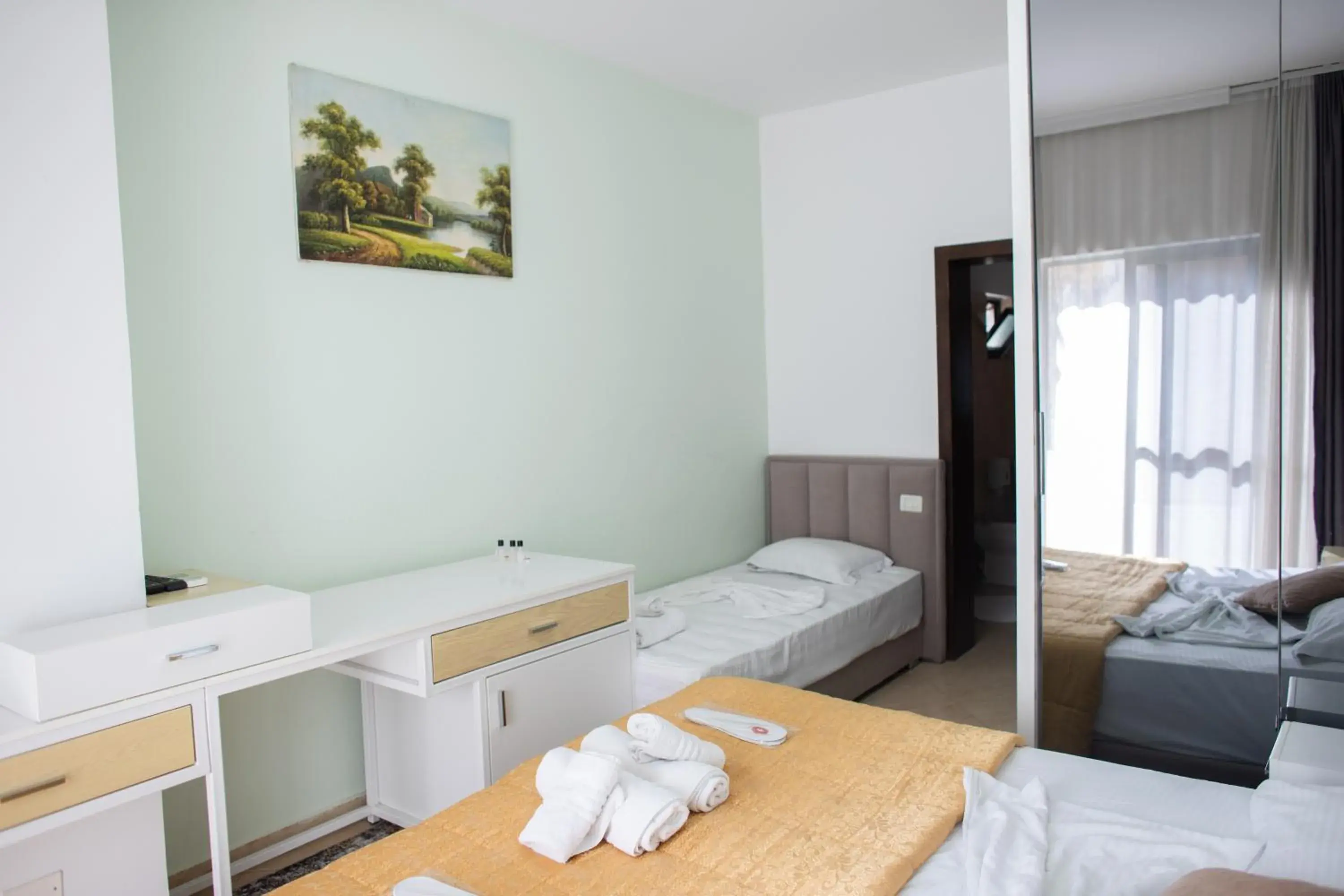 Standard Triple Room in VILA SANREMO Standard Triple Room in VILA SANREMO