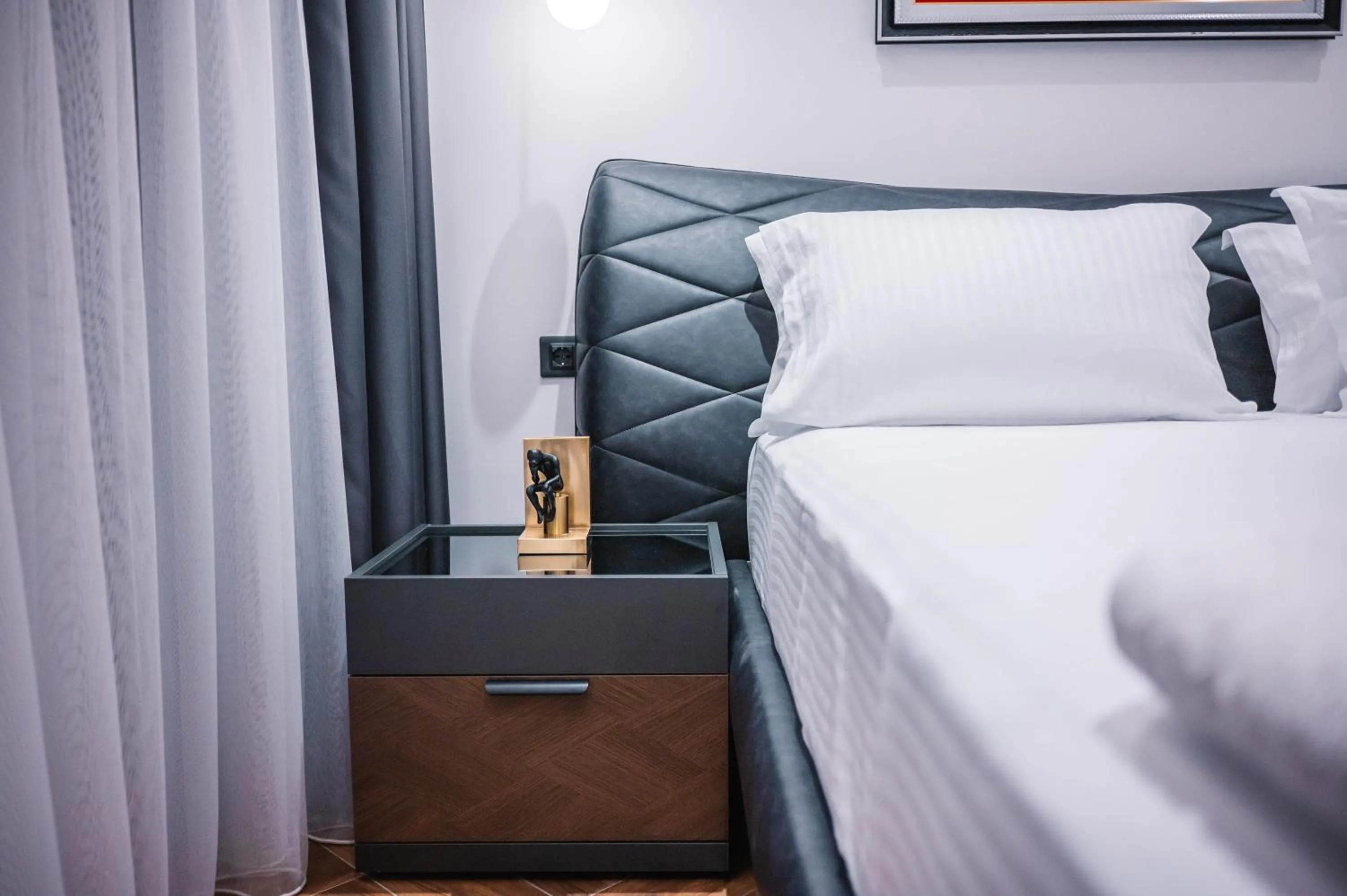 Bed in Giardino Lux Apartments