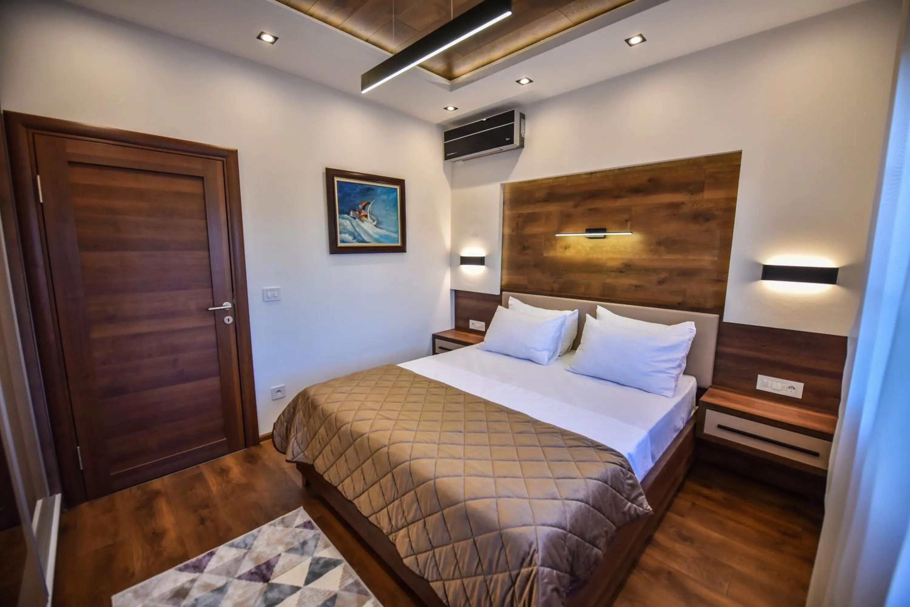 Bed in Giardino Lux Apartments