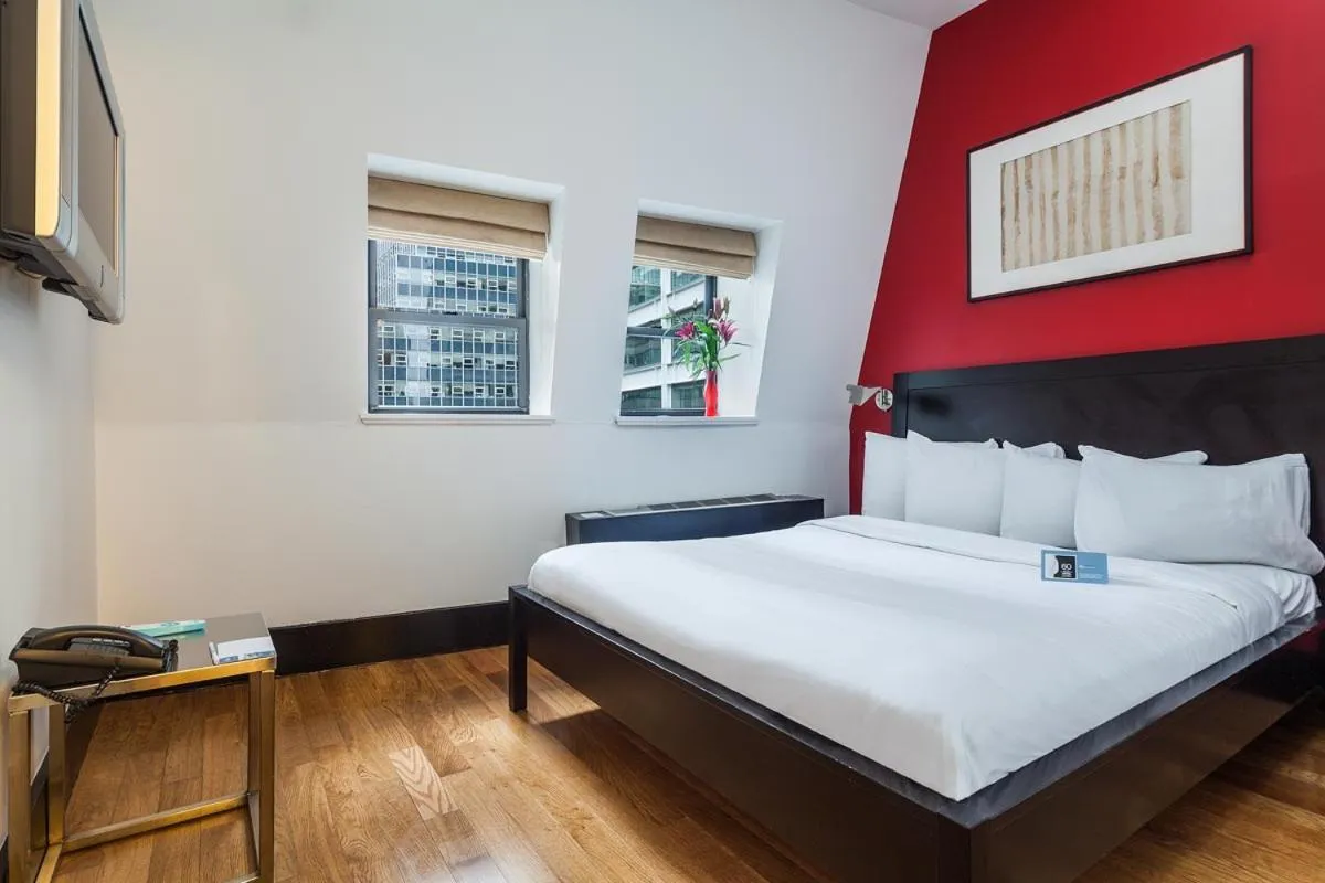 Bed in Eurostars Wall Street