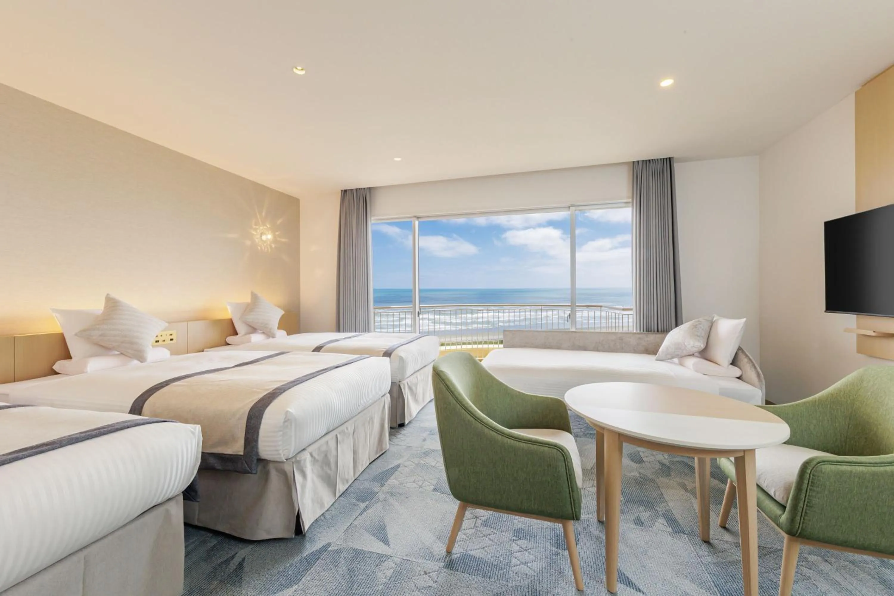 Bed in KAMENOI HOTEL Kujukuri