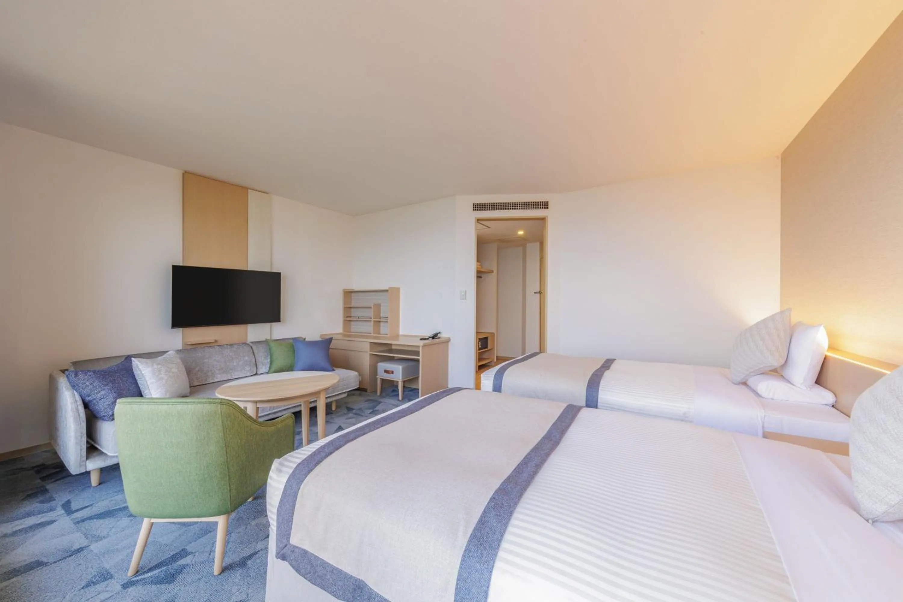 Bed in KAMENOI HOTEL Kujukuri