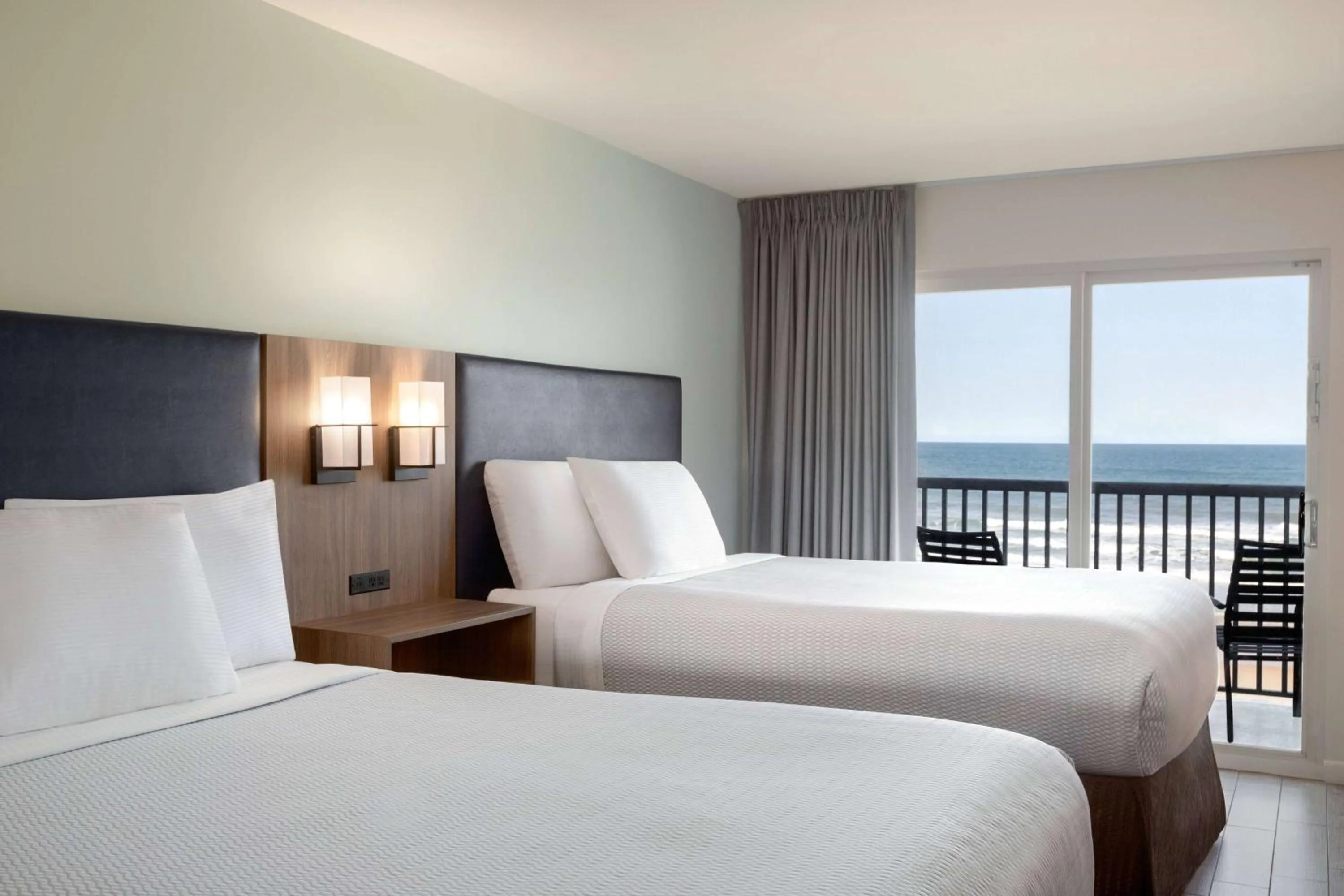 Photo of the whole room, Bed in La Quinta by Wyndham Oceanfront Daytona Beach