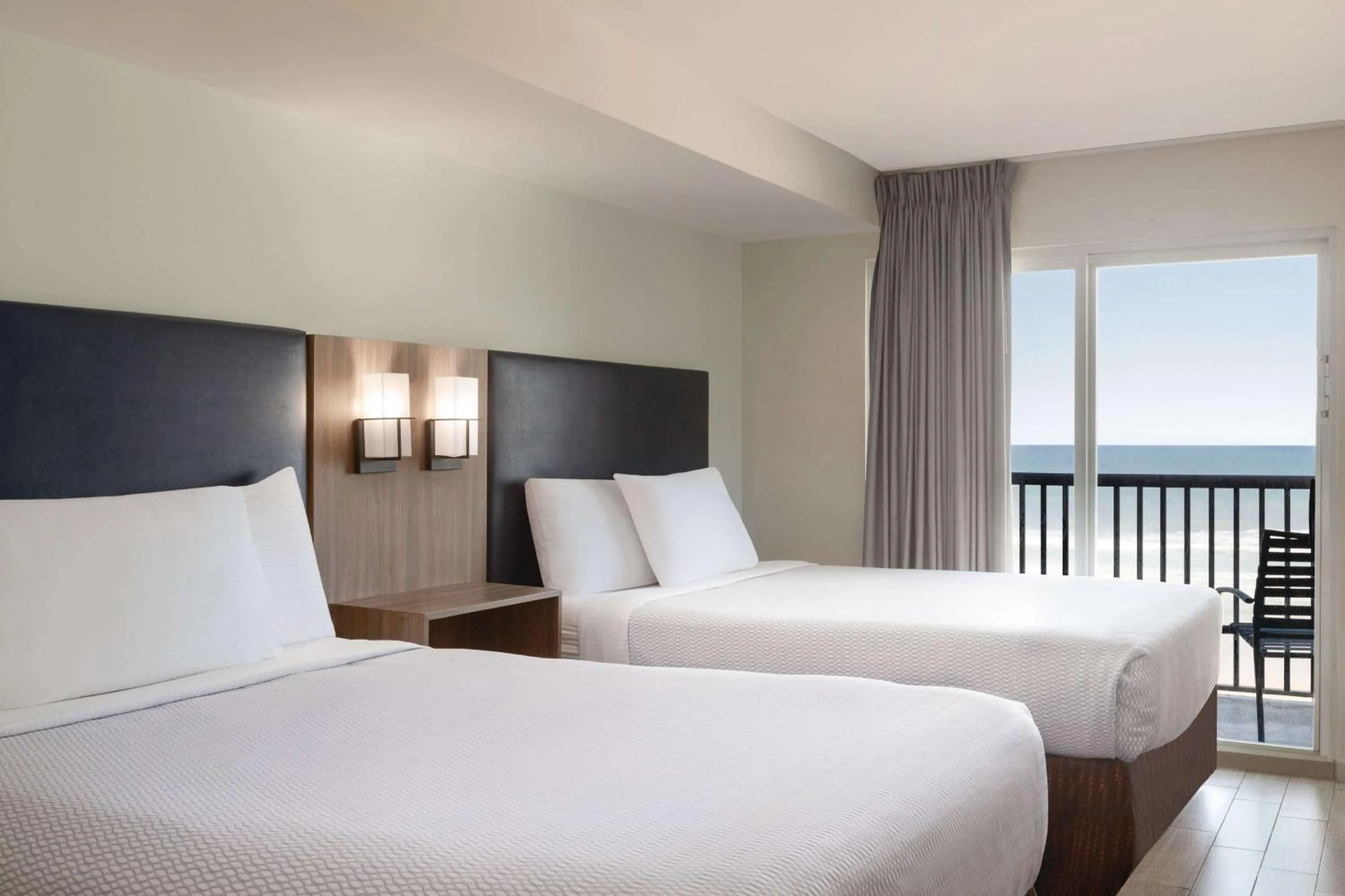 Photo of the whole room, Bed in La Quinta by Wyndham Oceanfront Daytona Beach