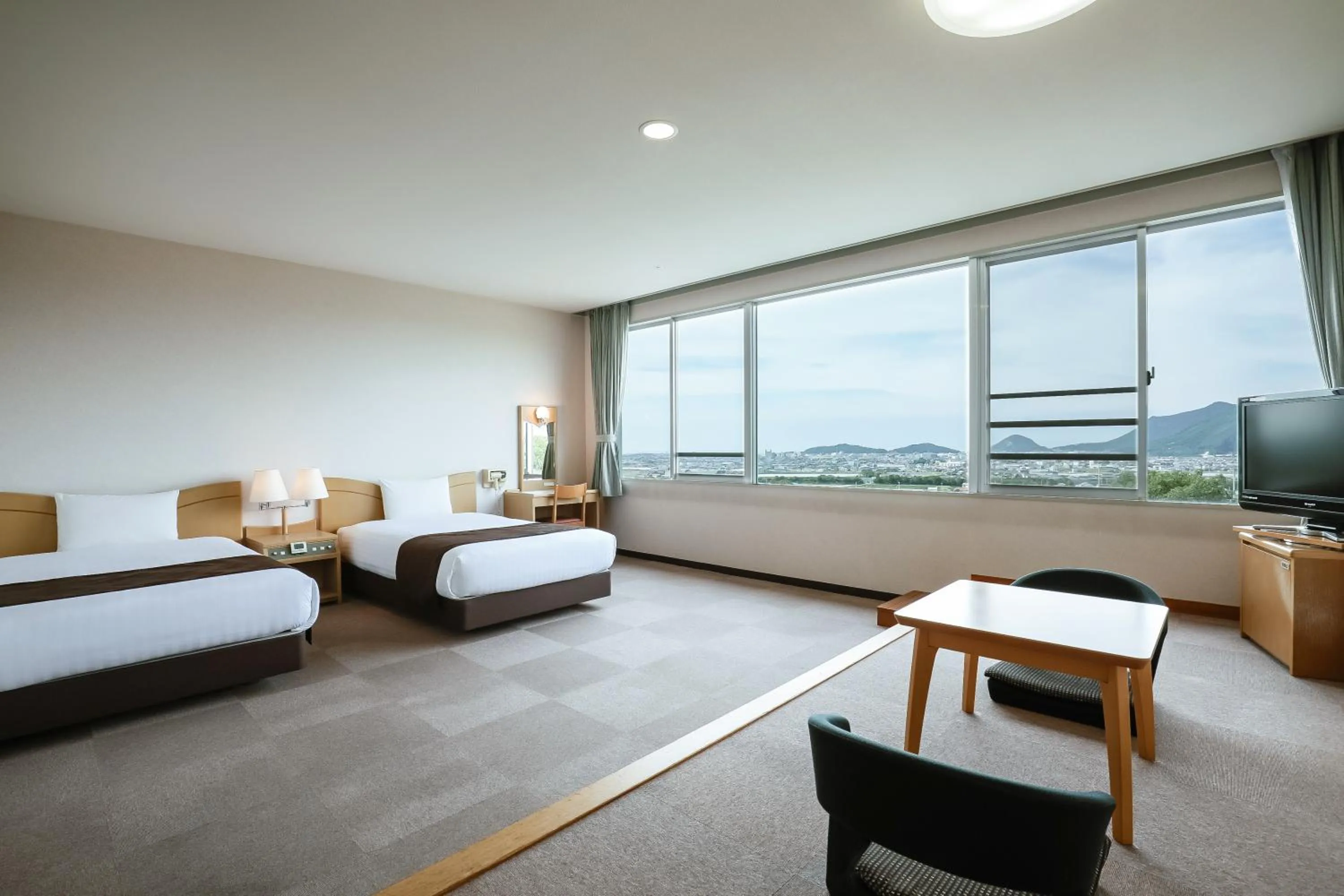 Bed in KAMENOI HOTEL Kanonji