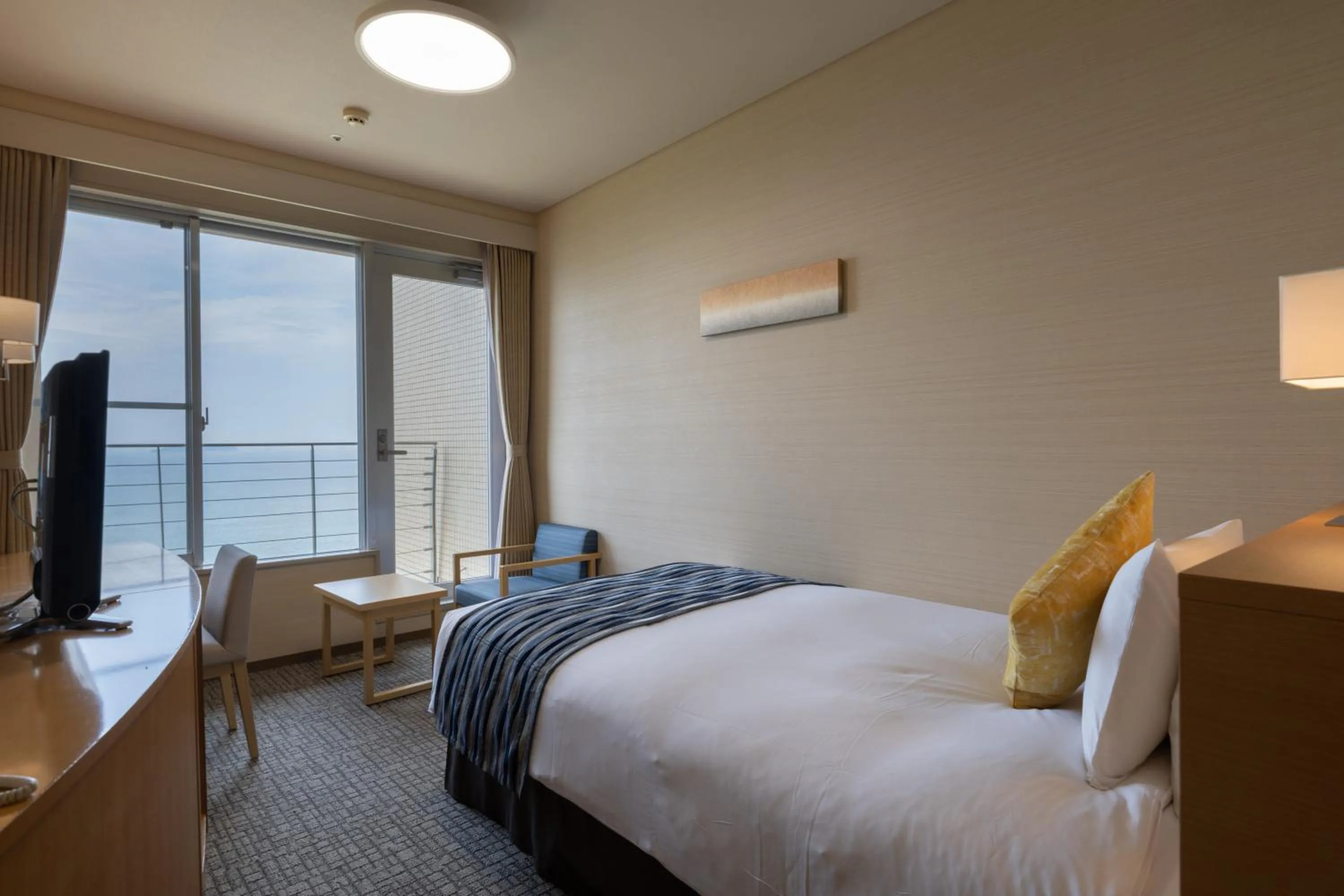 Photo of the whole room, Bed in KAMENOI HOTEL Ako