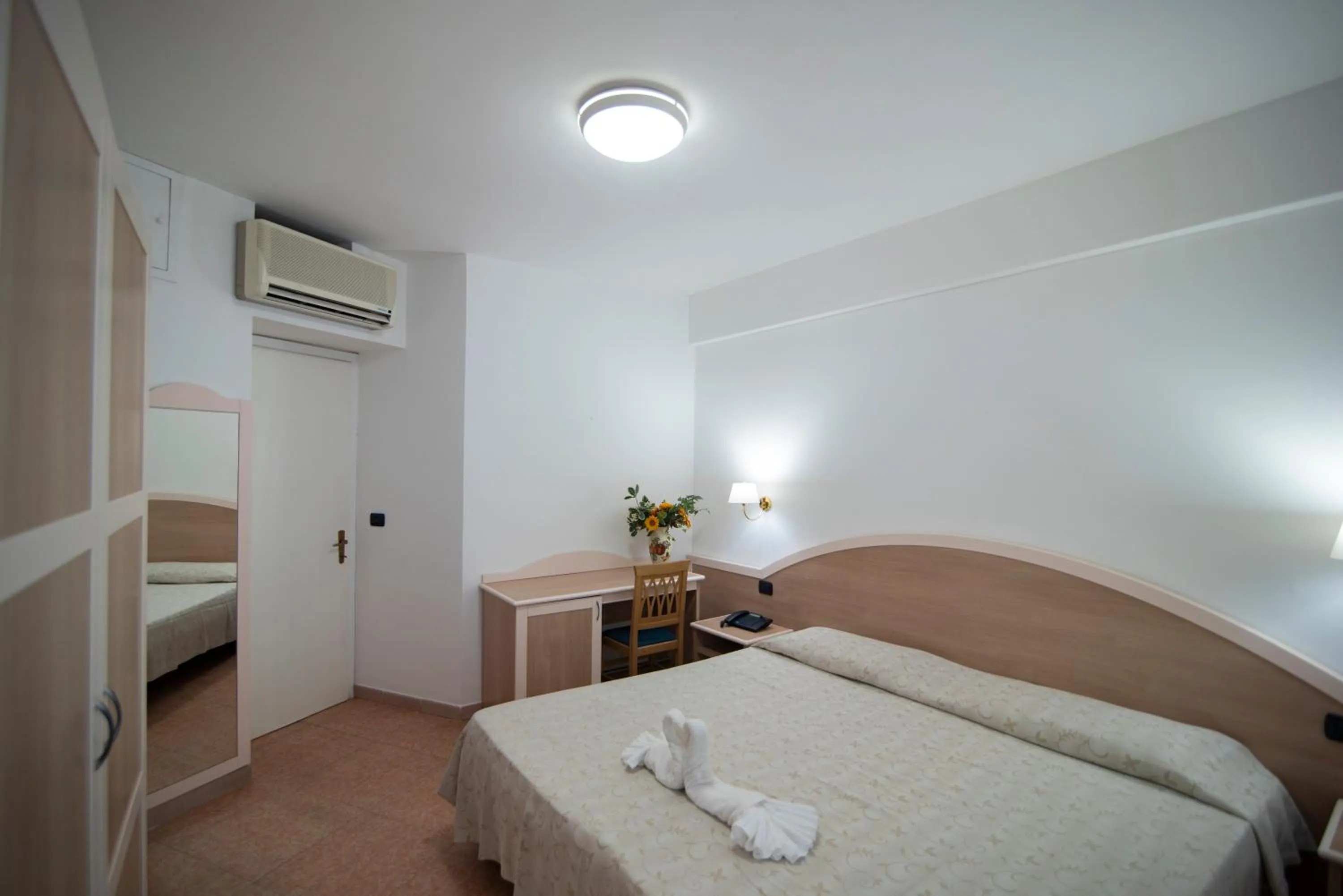Bed in Il Poggio Di Tropea Villaggio Soft All Inclusive