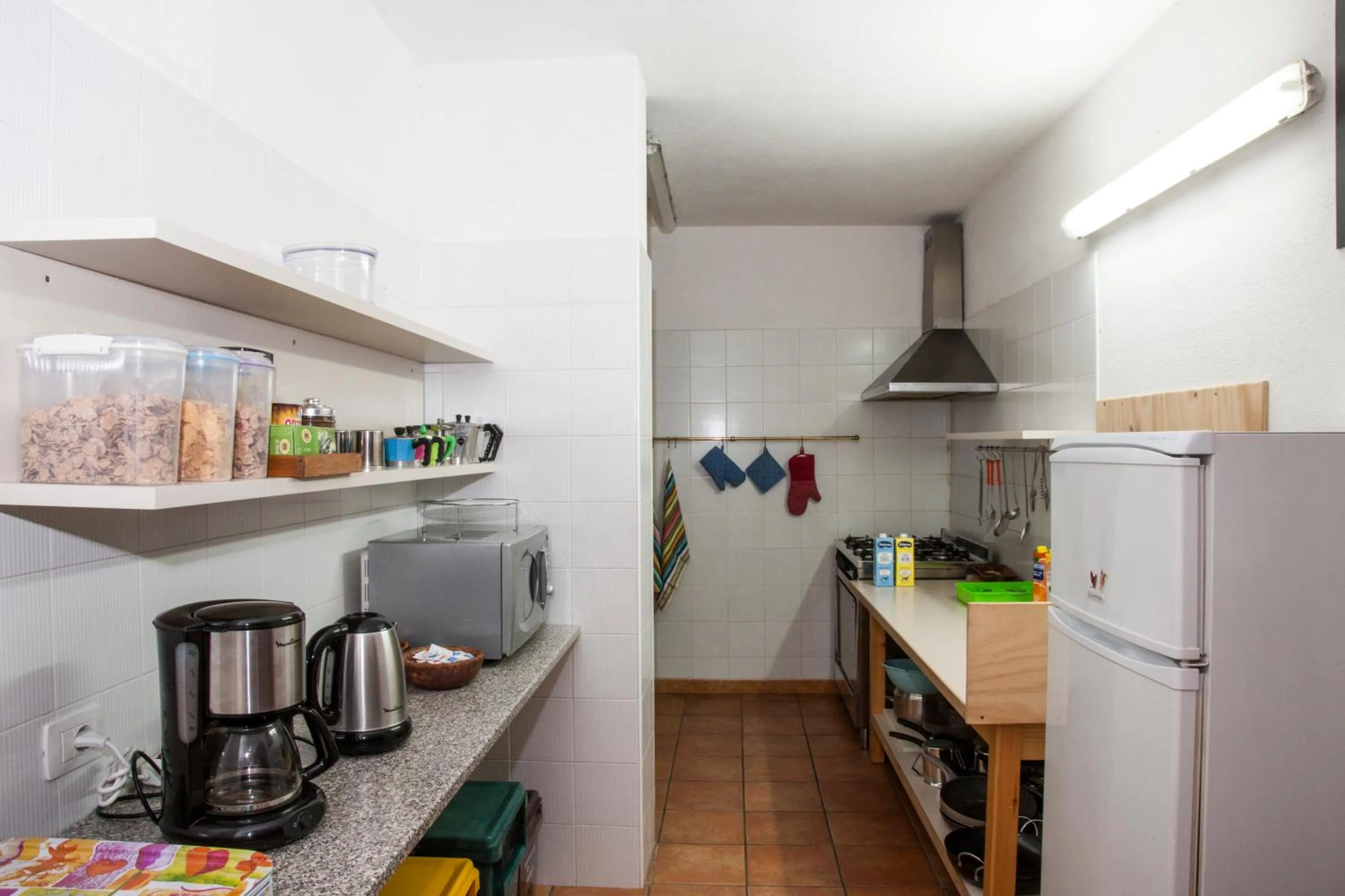 Communal kitchen in Il Locandiere