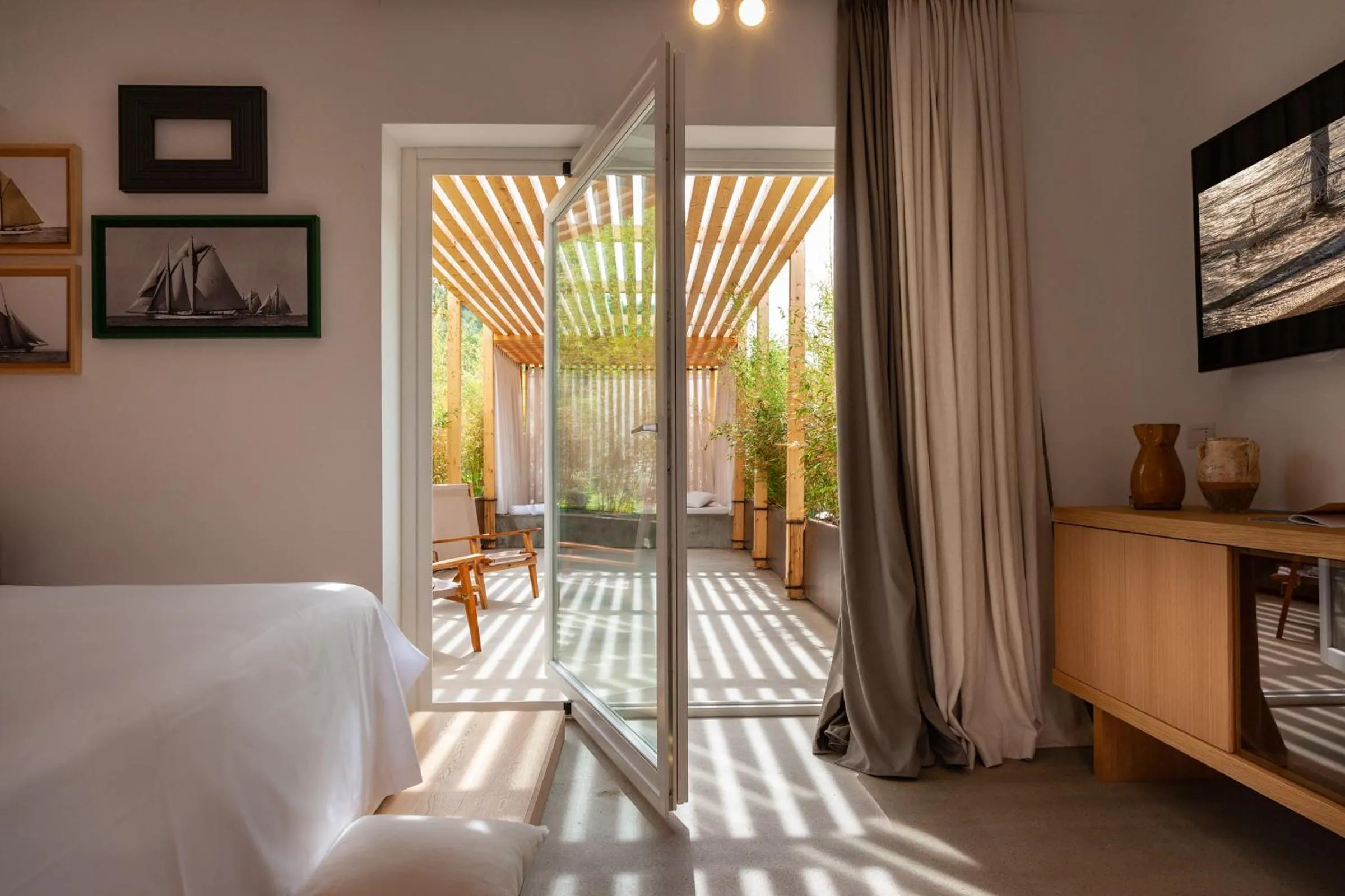 Bedroom, Bed in Praia Art Resort - Small Luxury Hotels of the world