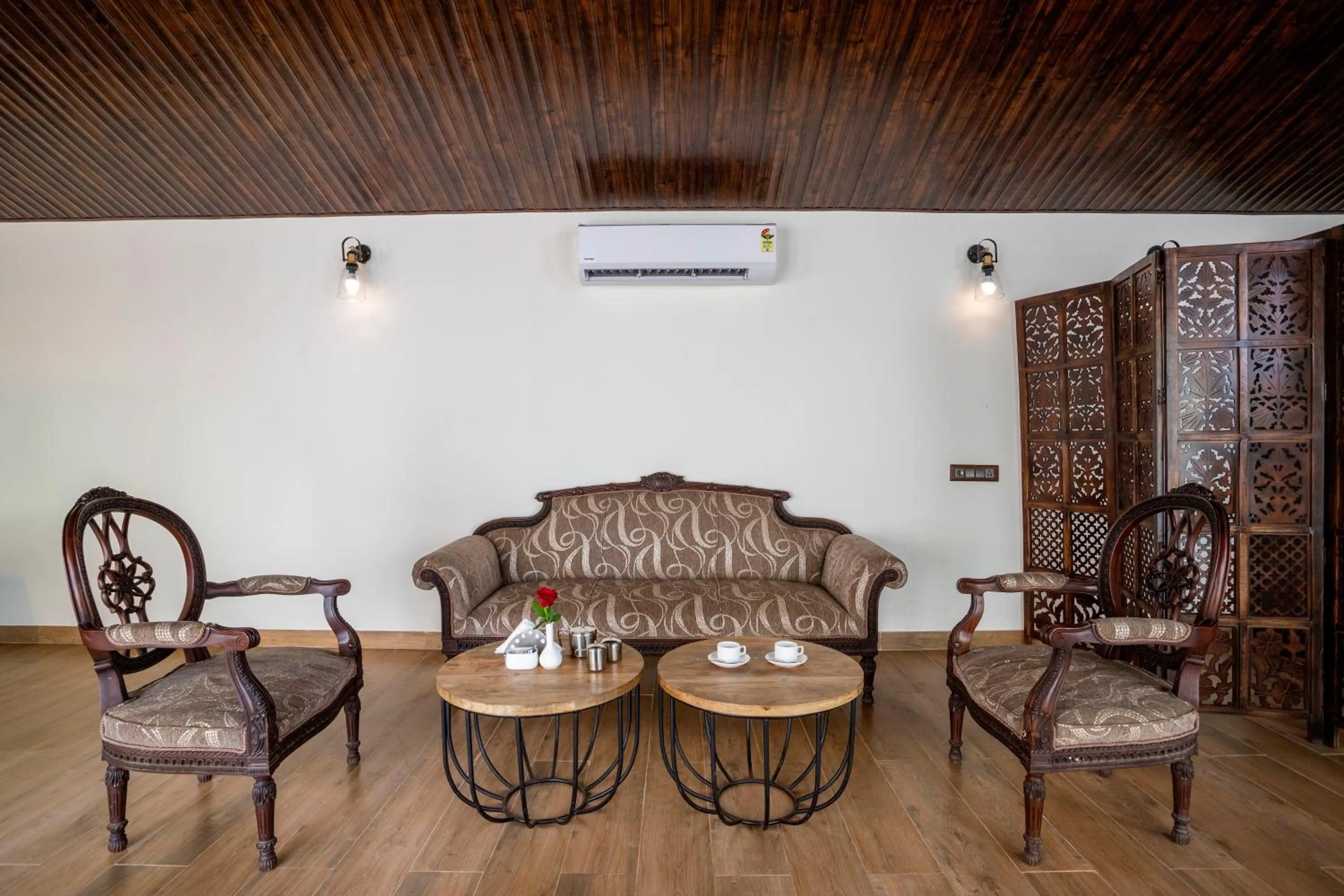 Seating area in Stone Wood Premier Gokarna