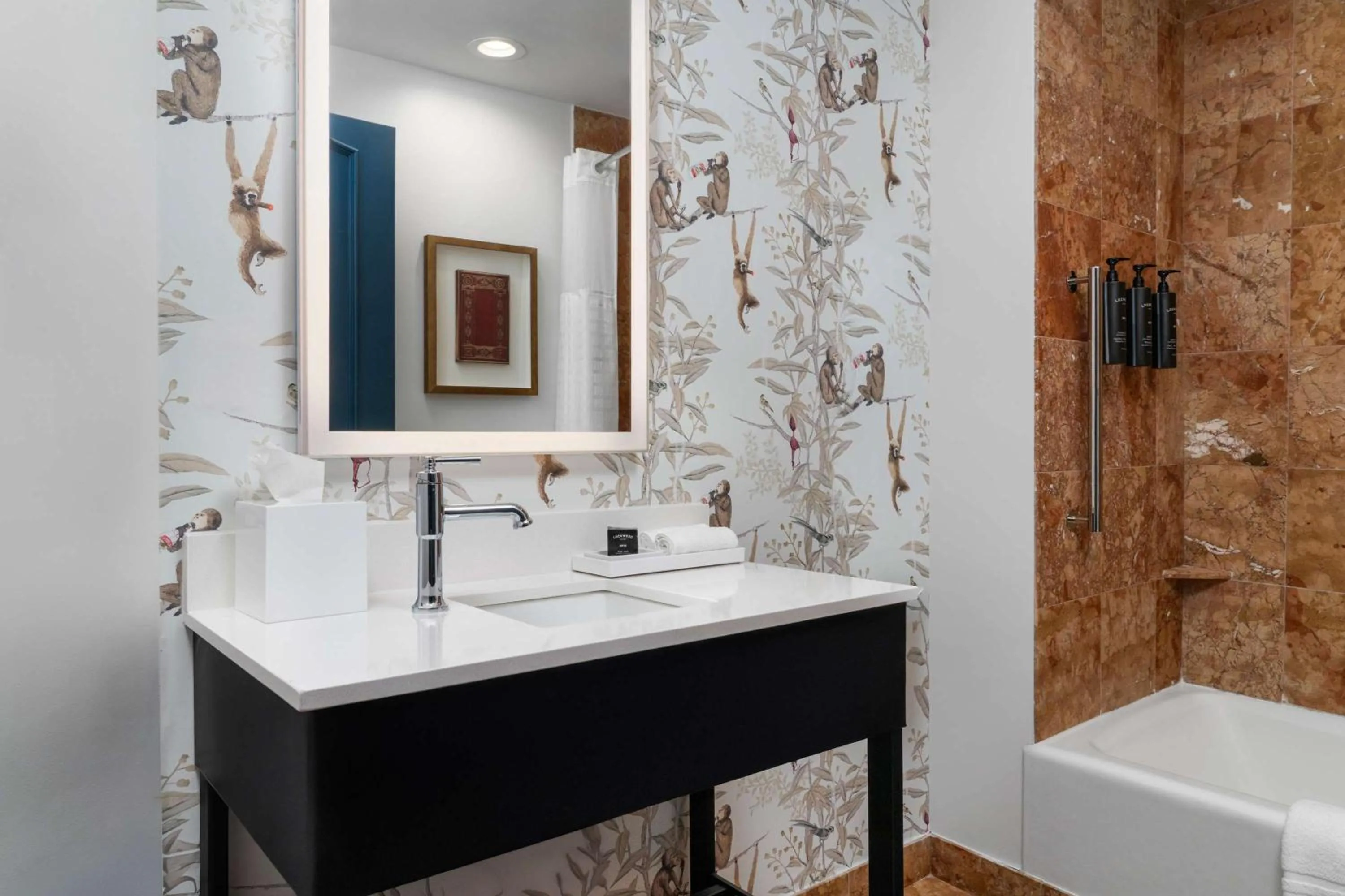 Bathroom in Hotel Theo New Orleans, Tapestry Collection by Hilton