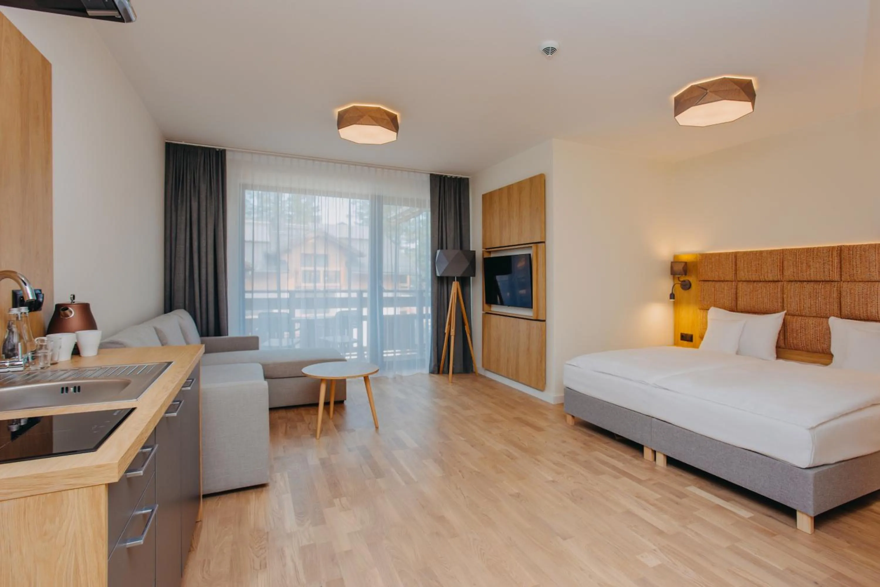 Photo of the whole room, Bed in Platinum Apartments