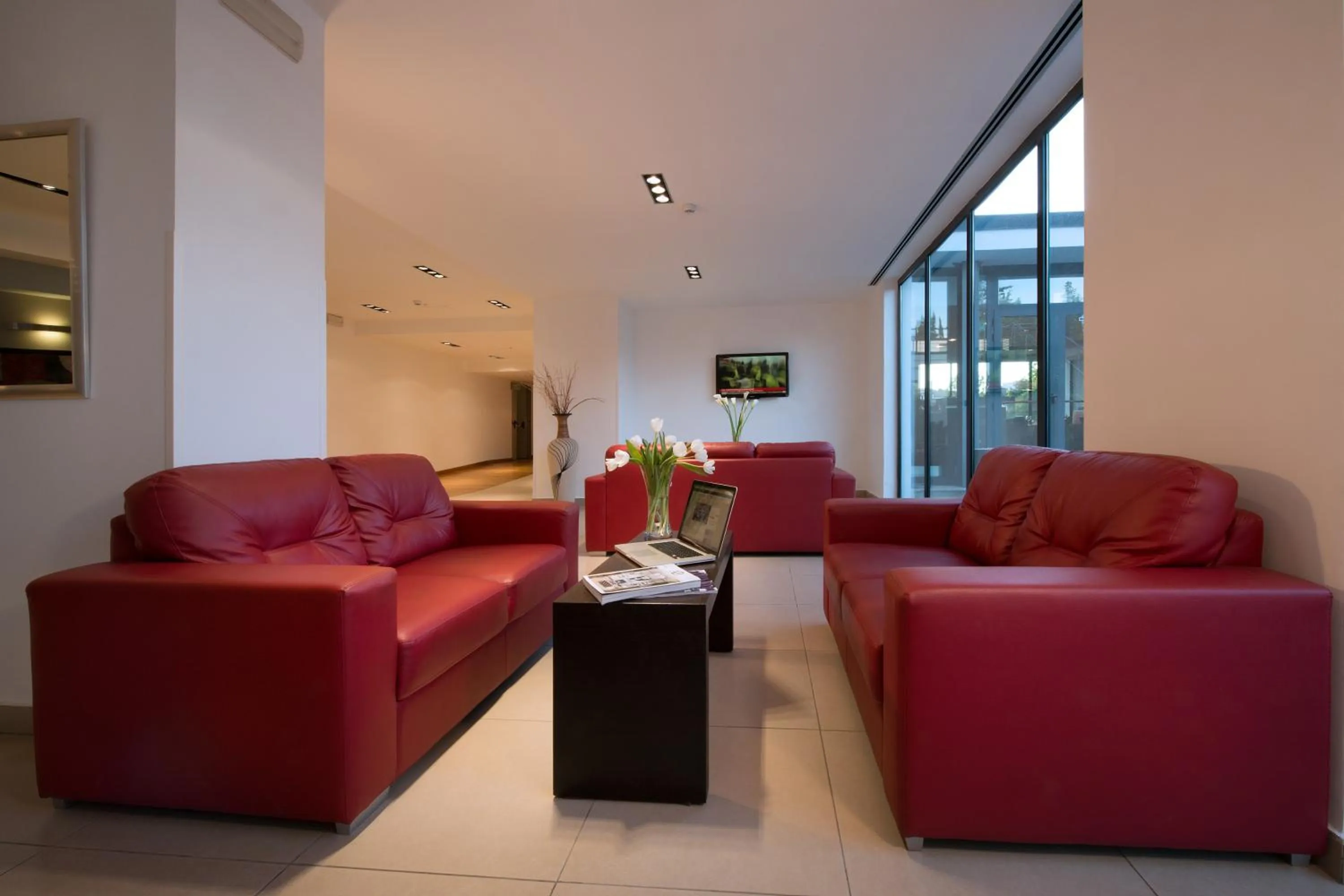 Communal lounge/ TV room in Garden Hotel