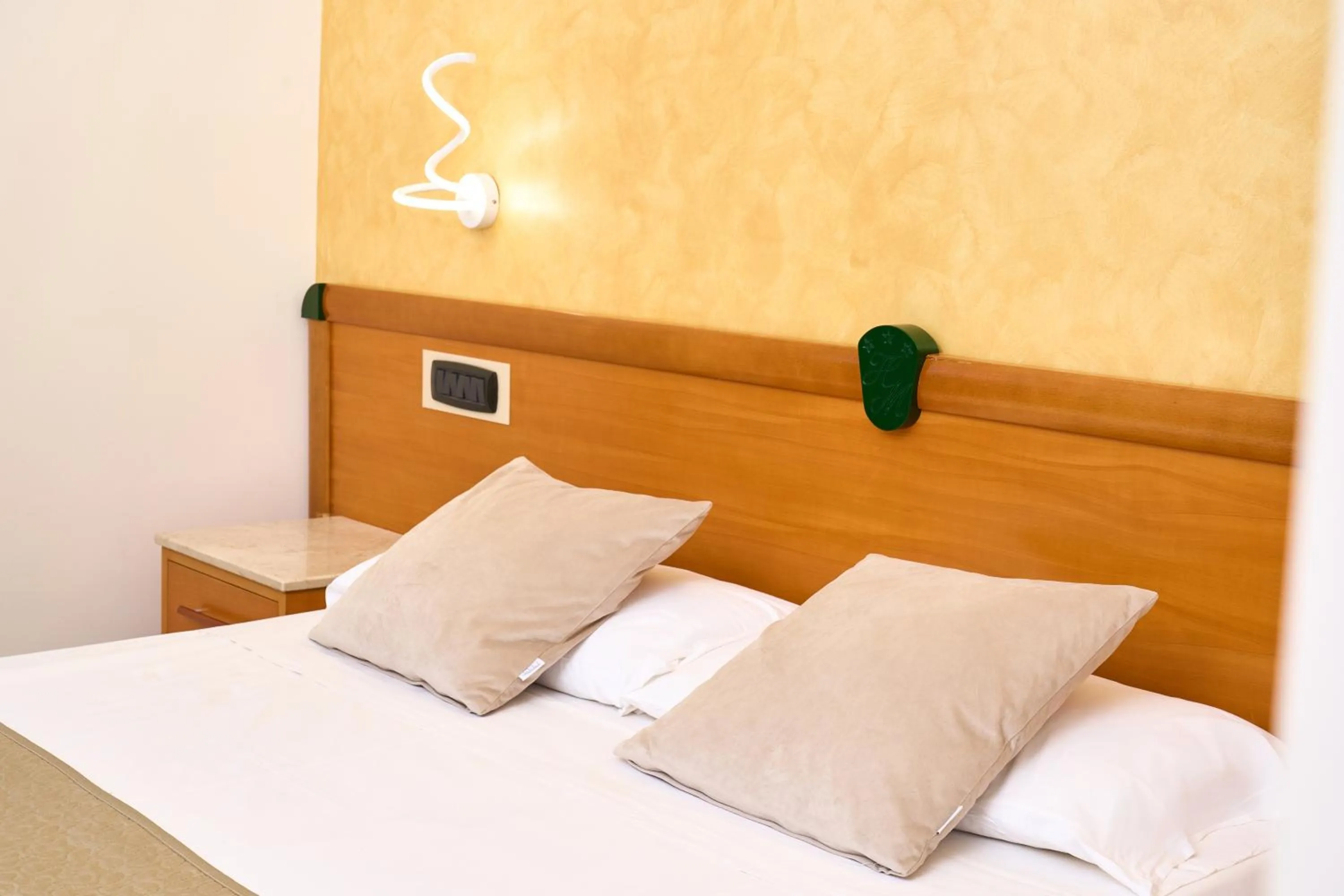 Bed in Hotel Miramare