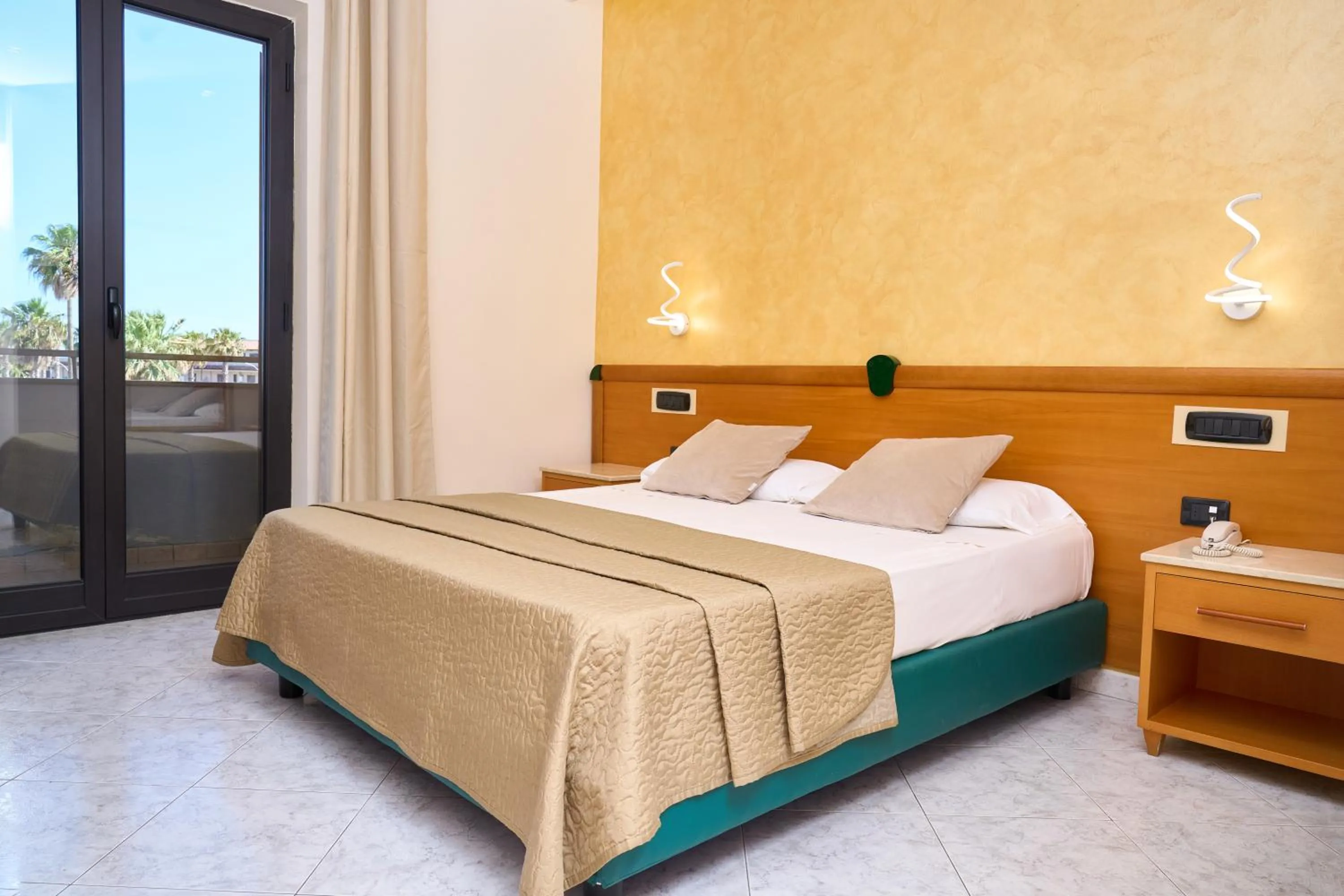 Bed in Hotel Miramare