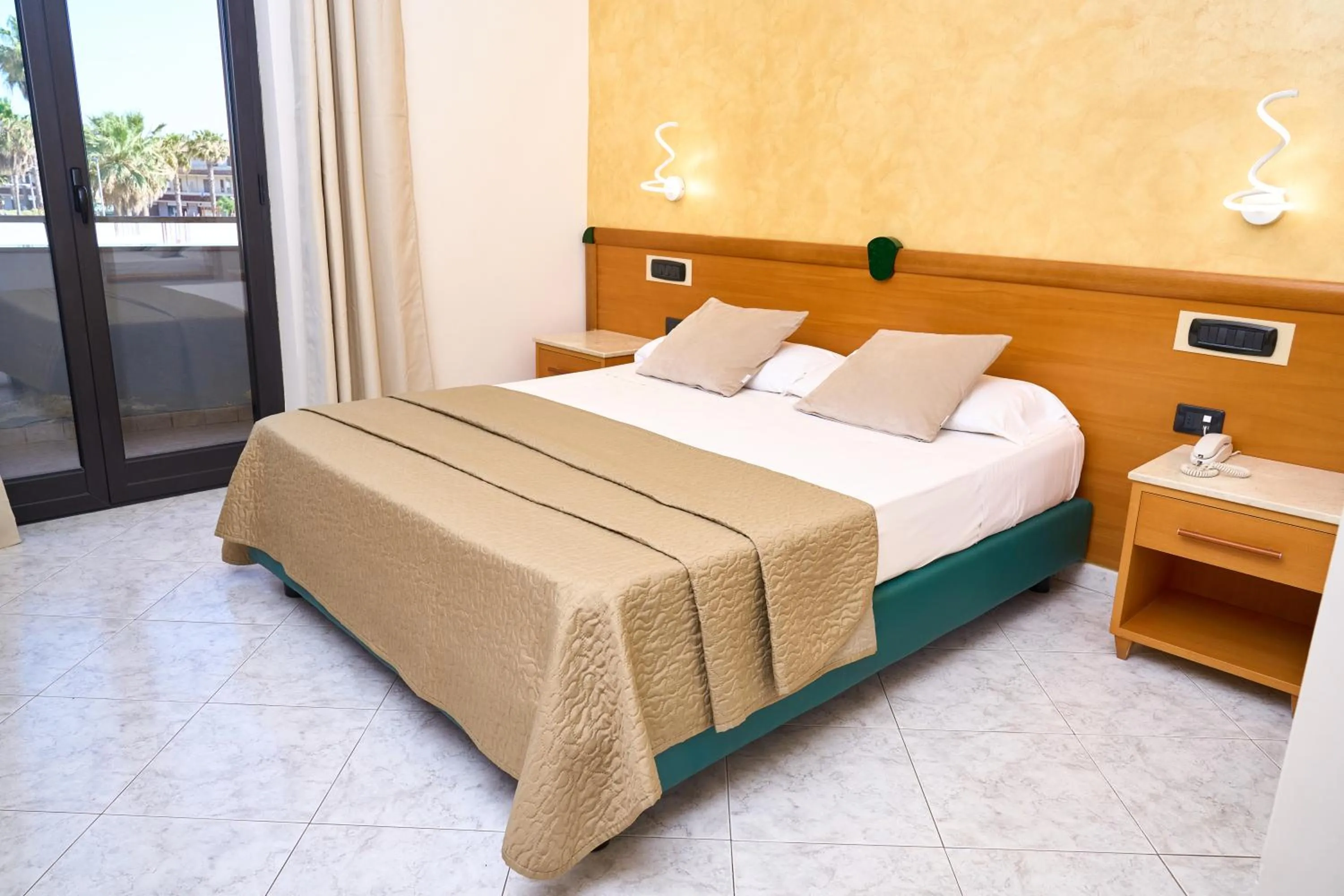 Bed in Hotel Miramare