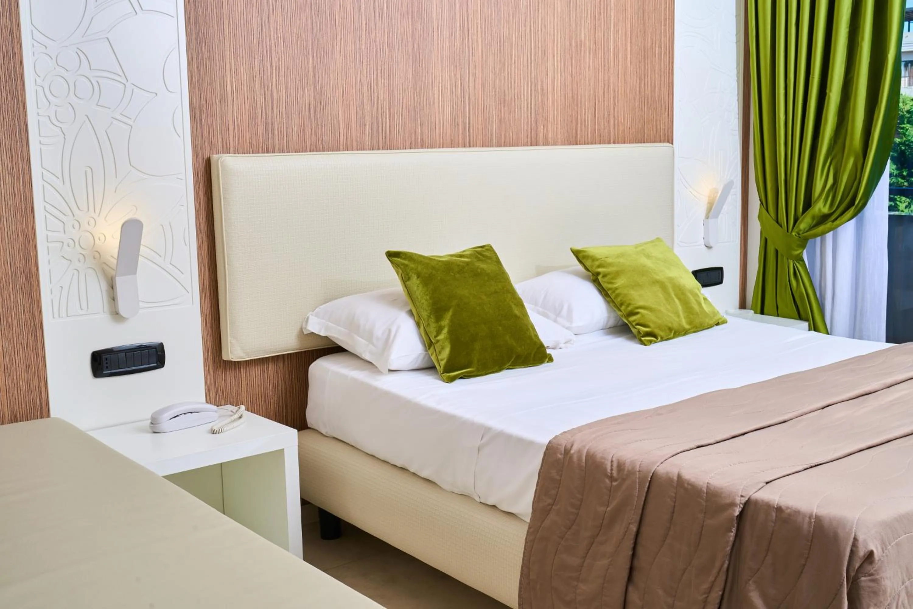 Bed in Hotel Miramare